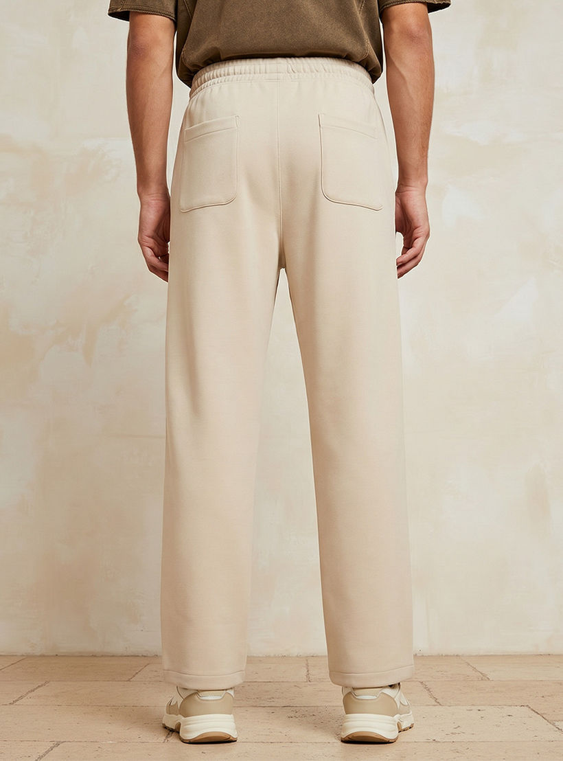 بنطلون رياضي إنترلوك بقصة مريحة وحافة مفتوحة من سبلاش يوث-men-clothing-bottoms-joggers-image-4