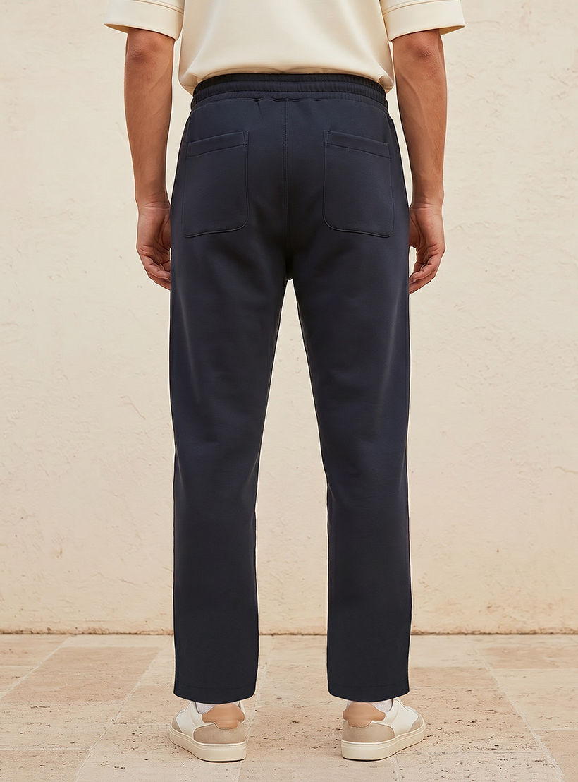 بنطلون رياضي إنترلوك بقصة مريحة وحافة مفتوحة من سبلاش يوث-men-clothing-bottoms-joggers-image-4