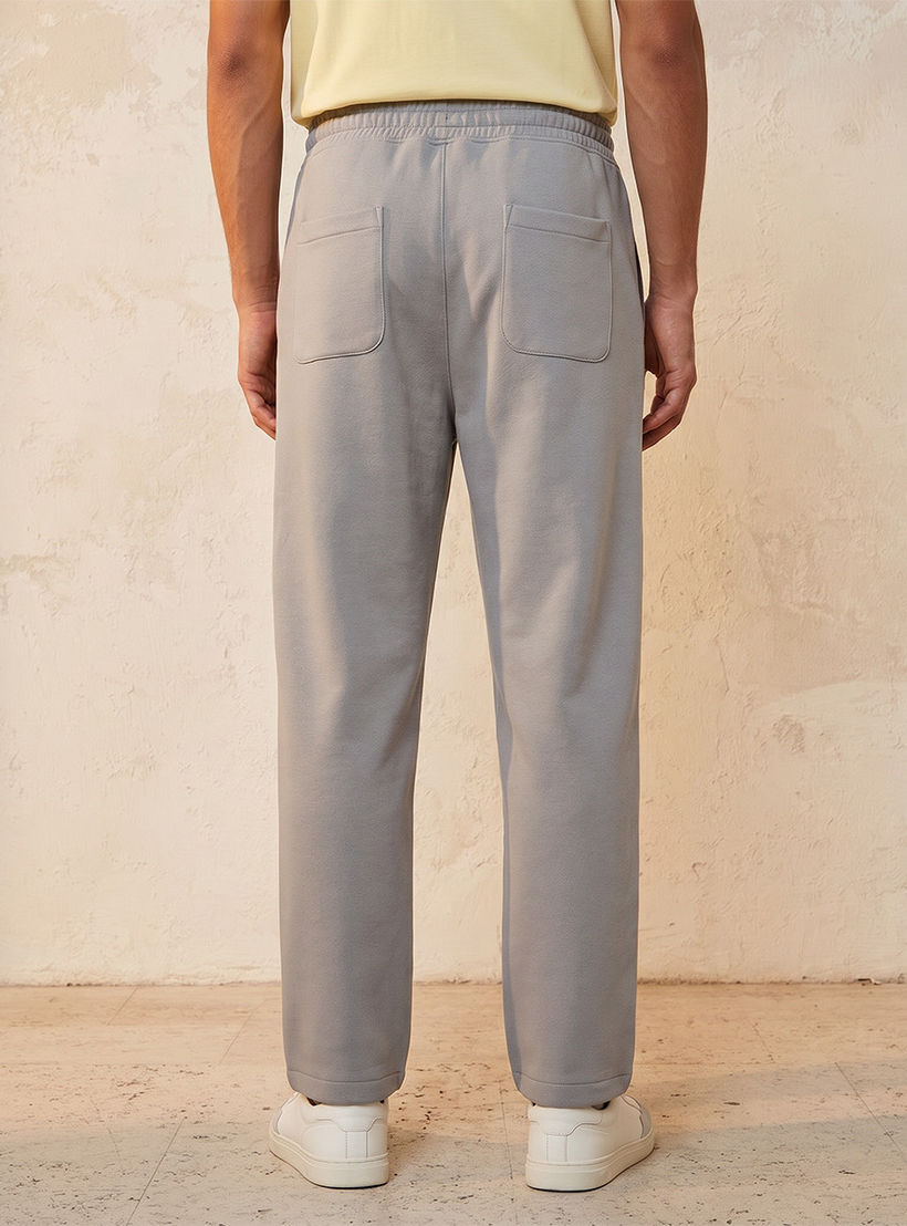 بنطلون رياضي إنترلوك بقصة مريحة وحافة مفتوحة من سبلاش يوث-men-clothing-bottoms-joggers-image-4