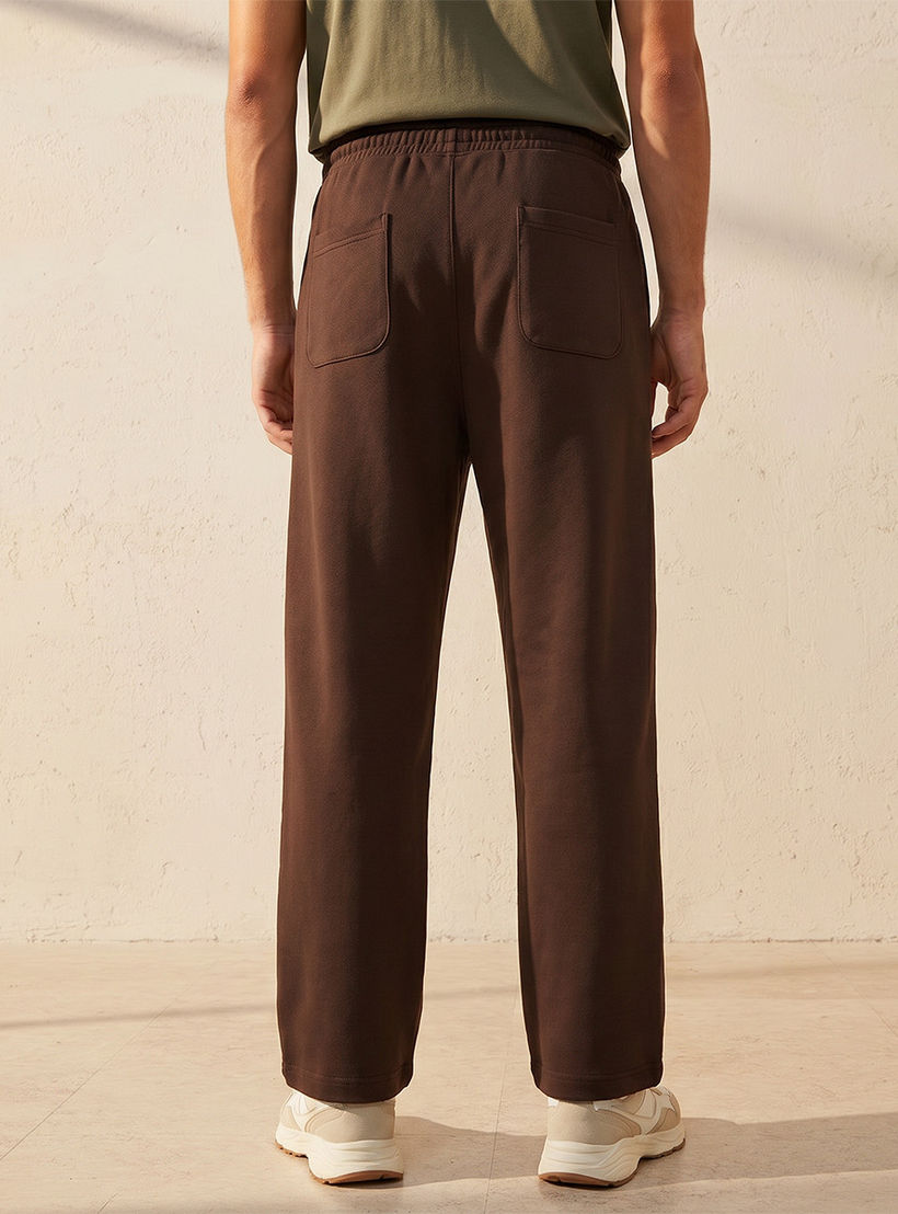 بنطلون رياضي إنترلوك بقصة مريحة وحافة مفتوحة من سبلاش يوث-men-clothing-bottoms-joggers-image-4