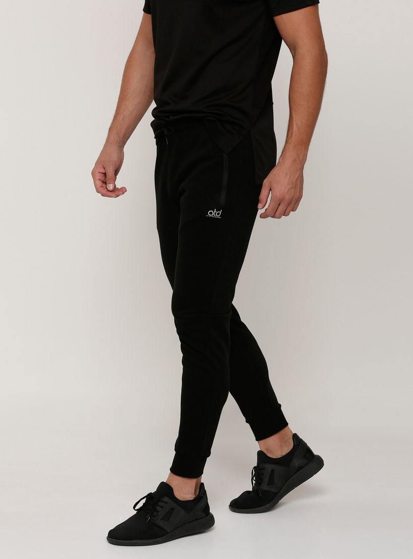 بنطال رياضي طويل بخصر مطّاطي وجيوب-men-clothing-sportswearandactivewear-bottoms-image-3