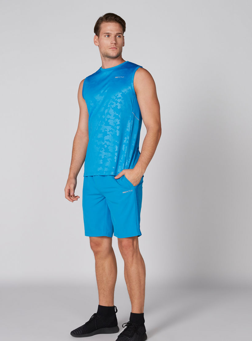 شورت بخصر مطّاطي وجيوب وتفاصيل شبكية-men-clothing-sportswearandactivewear-bottoms-image-1