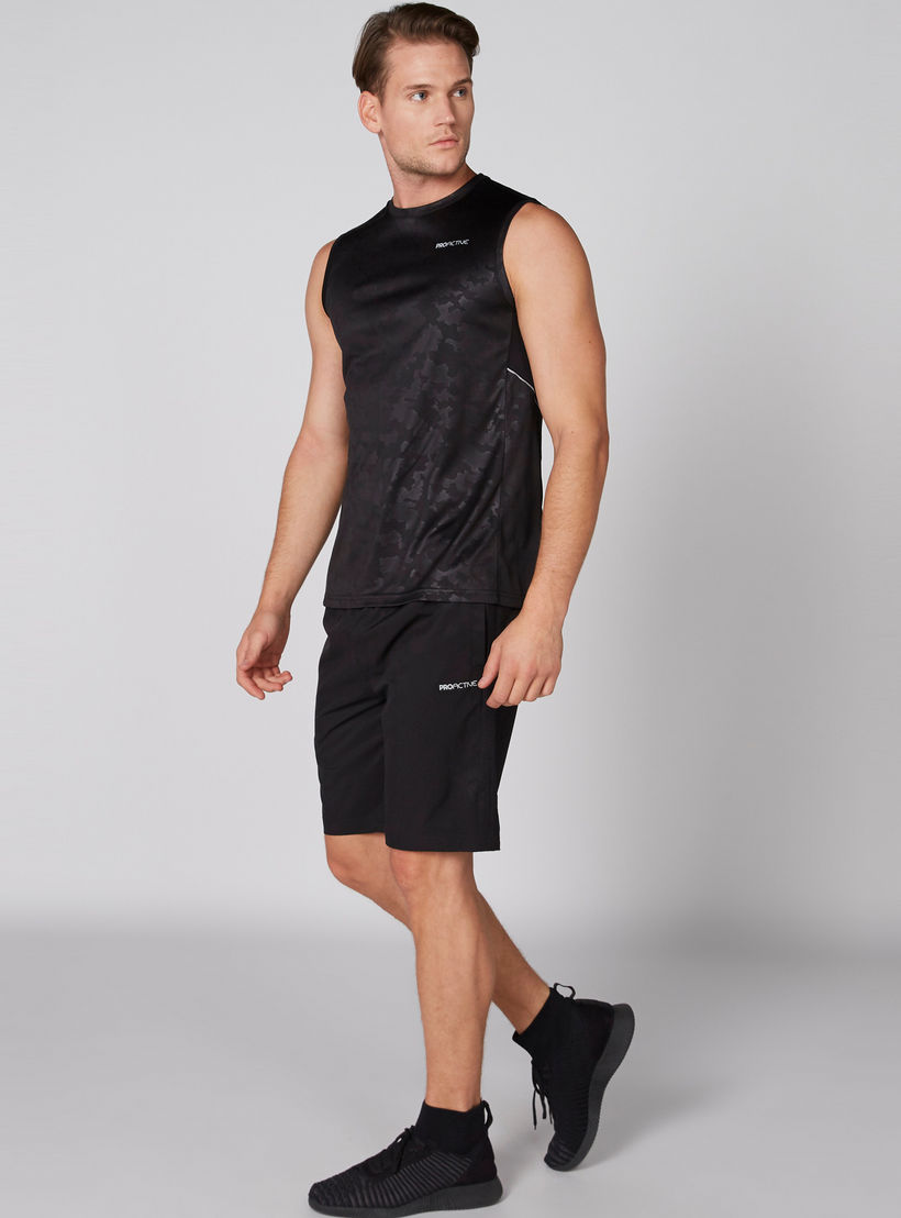 شورت بخصر مطّاطي وجيوب وتفاصيل شبكية-men-clothing-sportswearandactivewear-bottoms-image-1