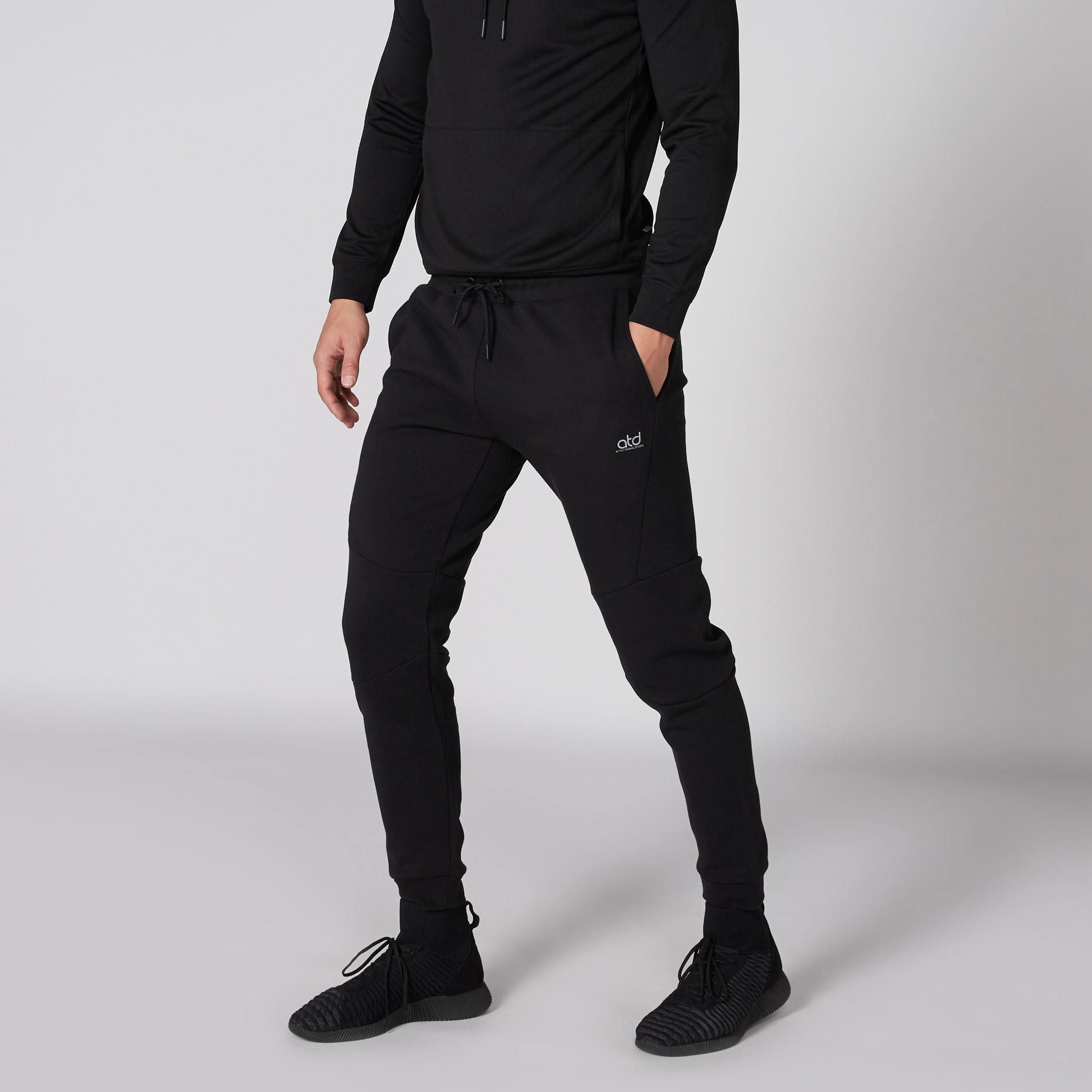 بنطال رياضي طويل بخصر مطّاطي وجيوب-men-clothing-sportswearandactivewear-bottoms-image-3