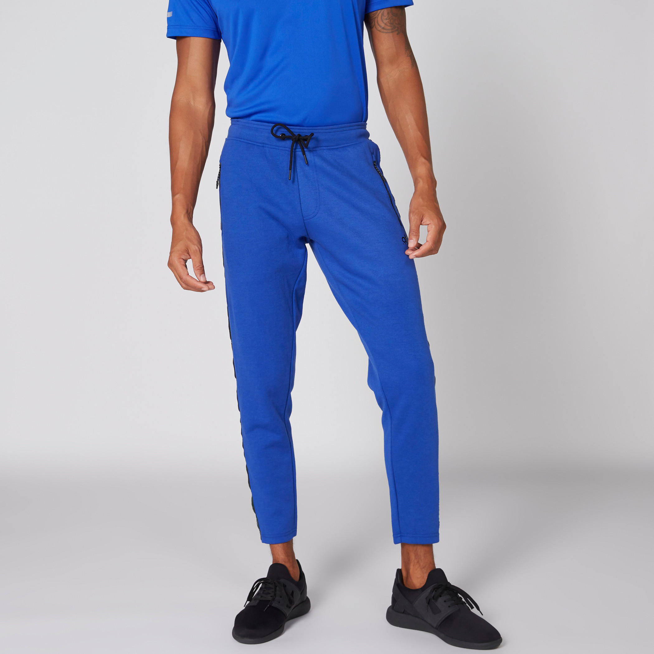 بنطال طويل بخصر مطّاطي مزيّن بشريطة-men-clothing-sportswearandactivewear-bottoms-image-1