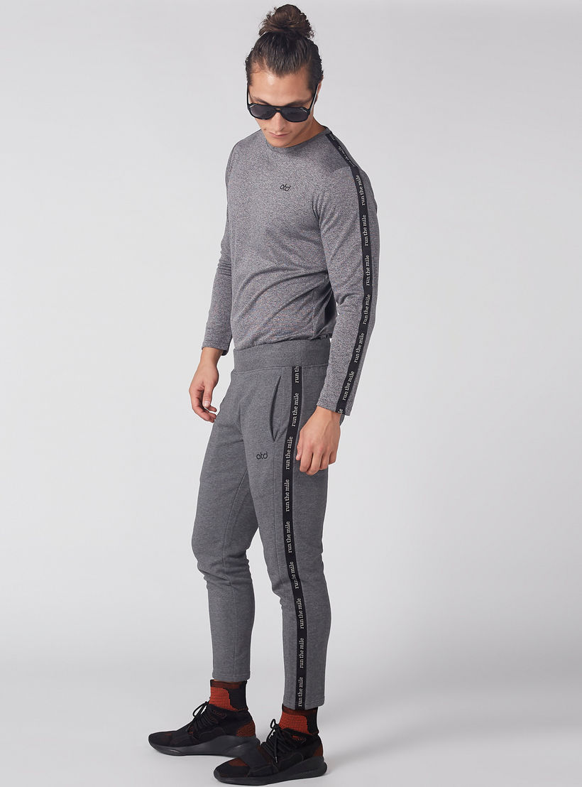 بنطال بخصر مطّاطي وجيوب-men-clothing-sportswearandactivewear-bottoms-image-3