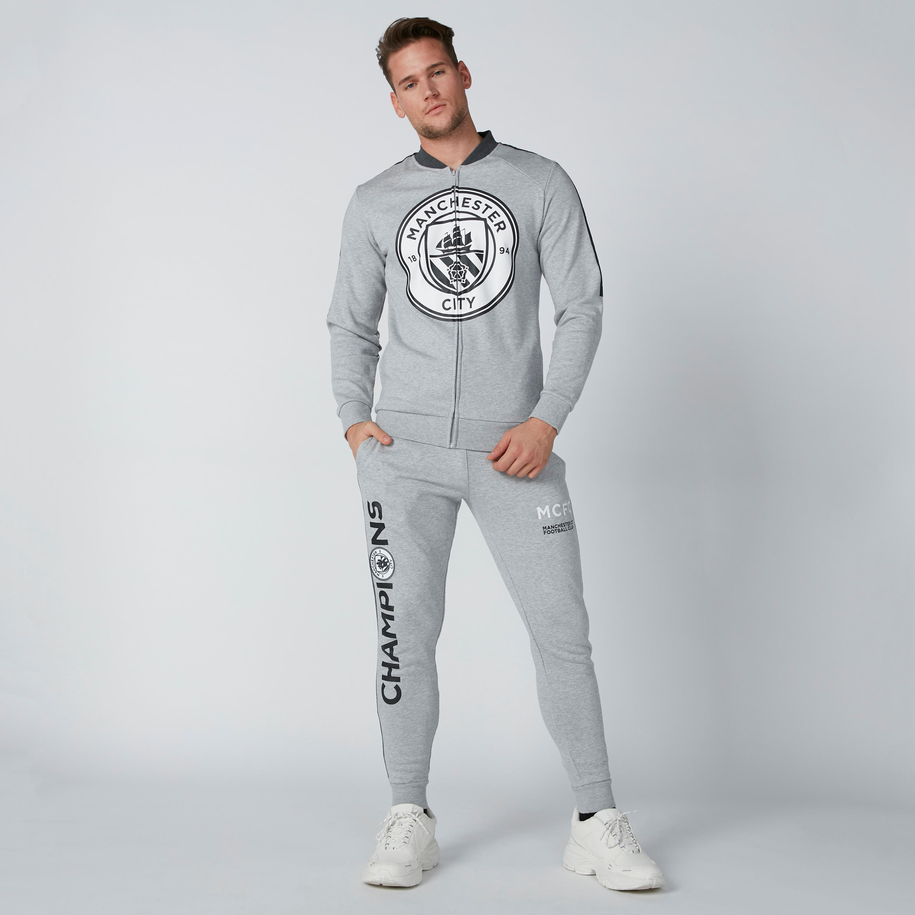 جاكيت بسحّاب إغلاق وجيوب وطبعات مانشستر سيتي-men-clothing-jacketsandblazers-jackets-image-1
