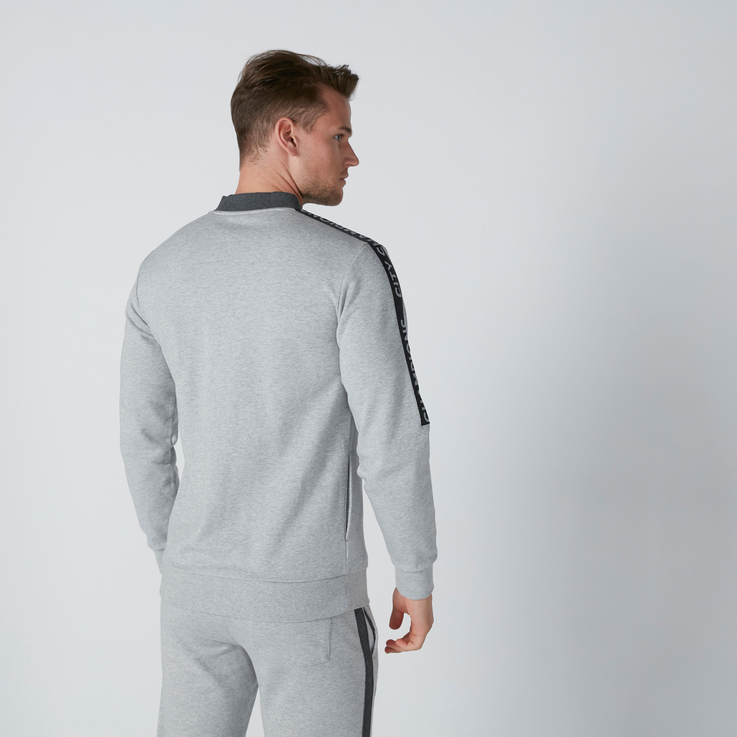 جاكيت بسحّاب إغلاق وجيوب وطبعات مانشستر سيتي-men-clothing-jacketsandblazers-jackets-image-2