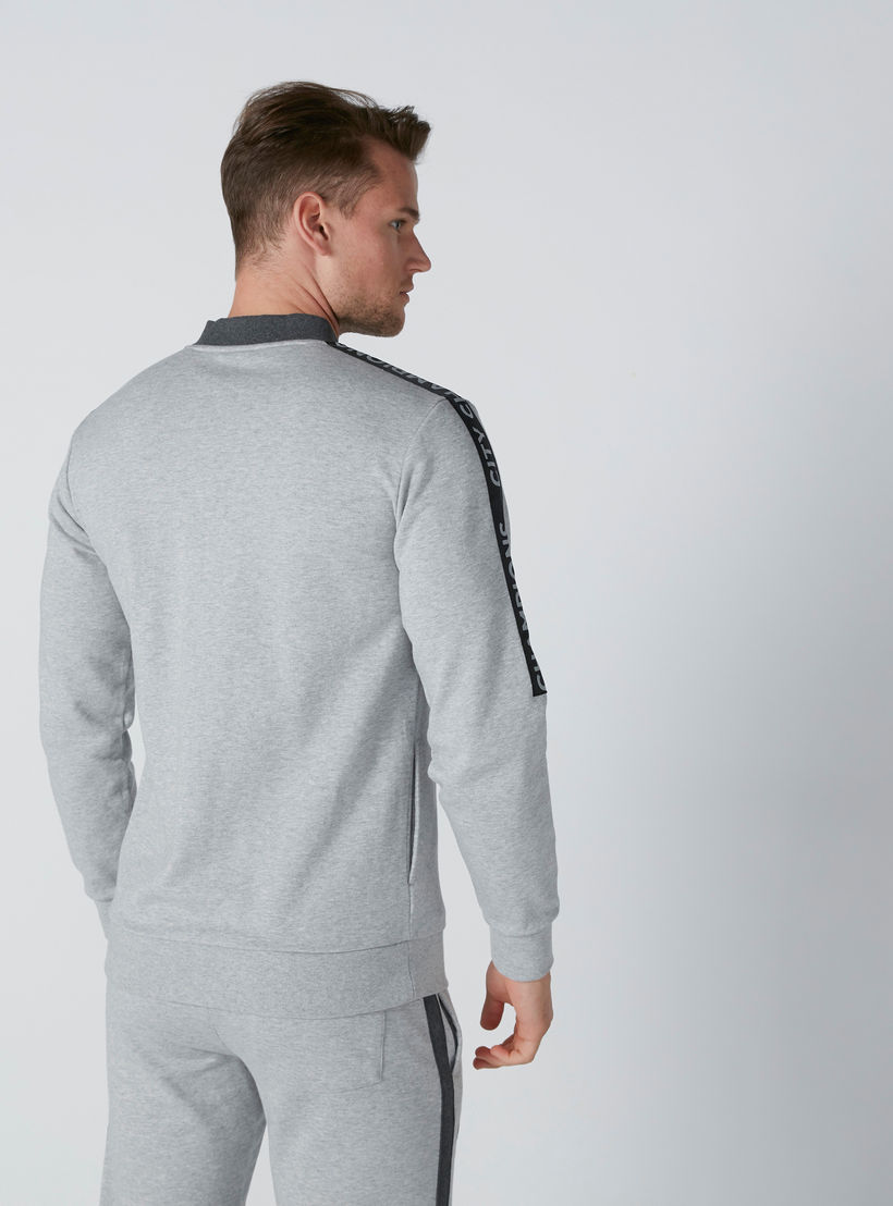 جاكيت بسحّاب إغلاق وجيوب وطبعات مانشستر سيتي-men-clothing-jacketsandblazers-jackets-image-2