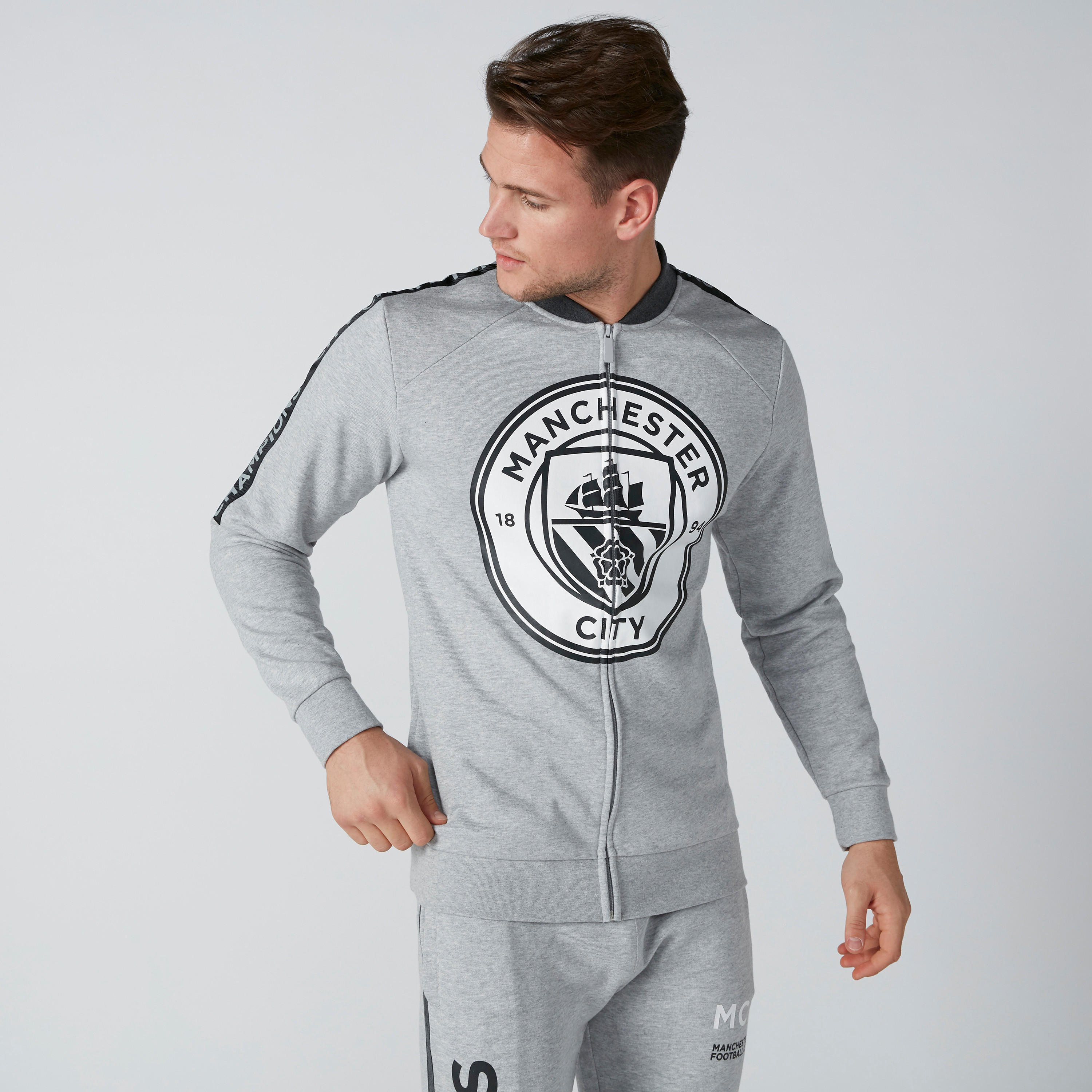 جاكيت بسحّاب إغلاق وجيوب وطبعات مانشستر سيتي-men-clothing-jacketsandblazers-jackets-image-3