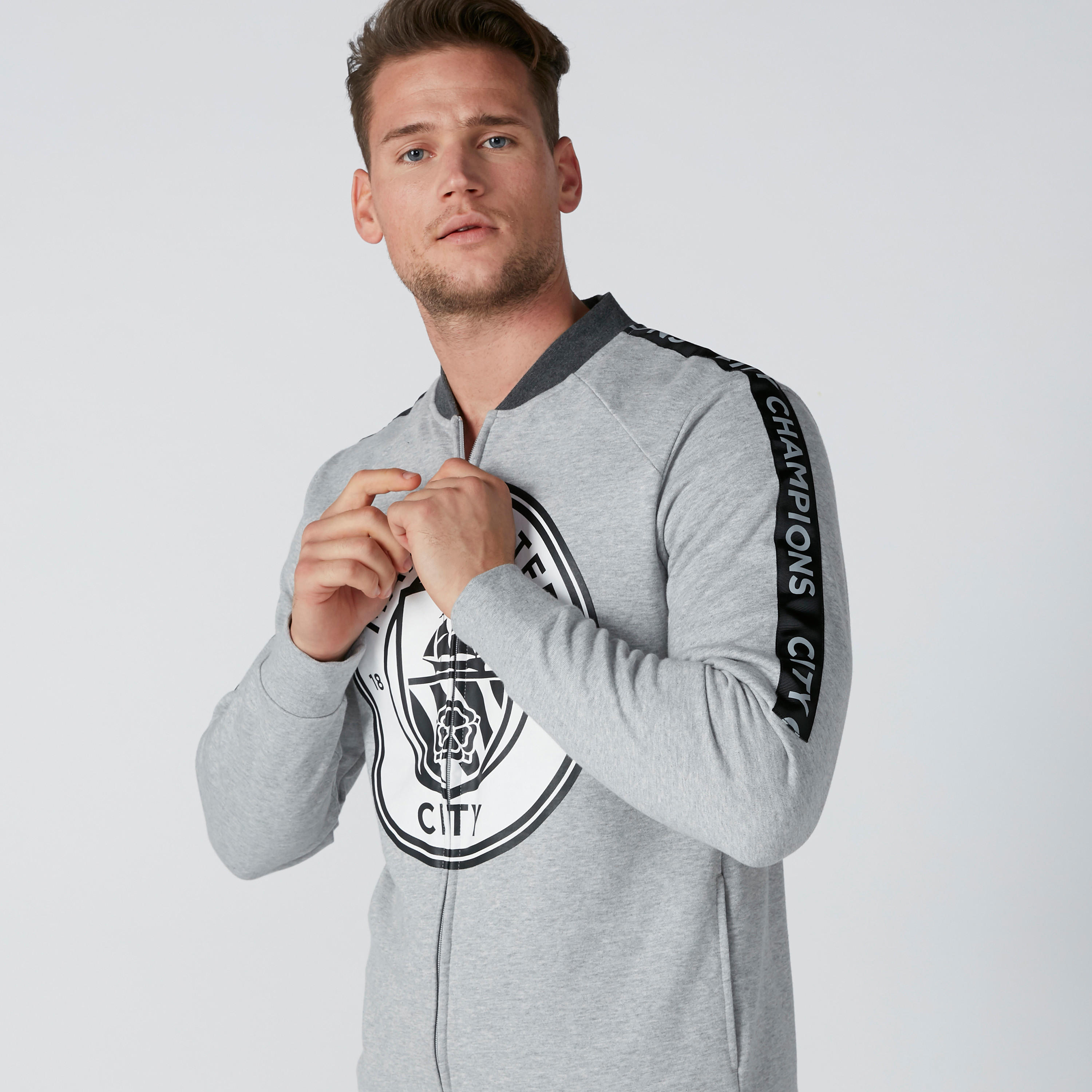 جاكيت بسحّاب إغلاق وجيوب وطبعات مانشستر سيتي-men-clothing-jacketsandblazers-jackets-image-6