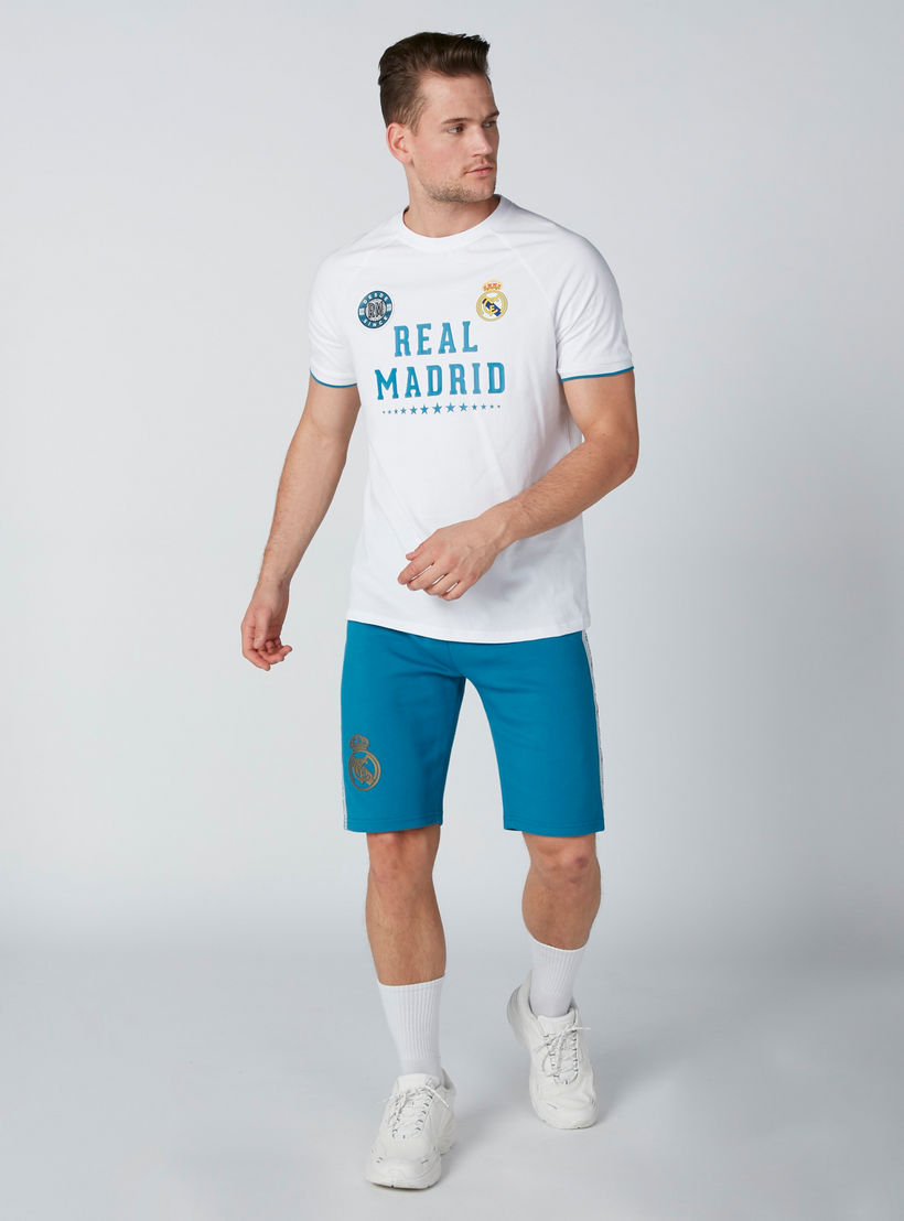 تيشيرت رياضي بياقة مستديرة وأكمام قصيرة وطبعات ريال مدريد-men-clothing-sportswearandactivewear-tshirtsandpolos-image-1