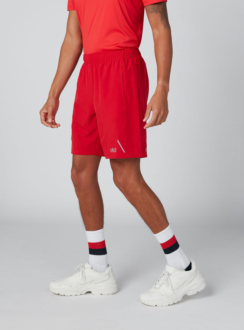 شورت بخصر مطّاطي وجيوب وطبعات-men-clothing-sportswearandactivewear-bottoms-image-1