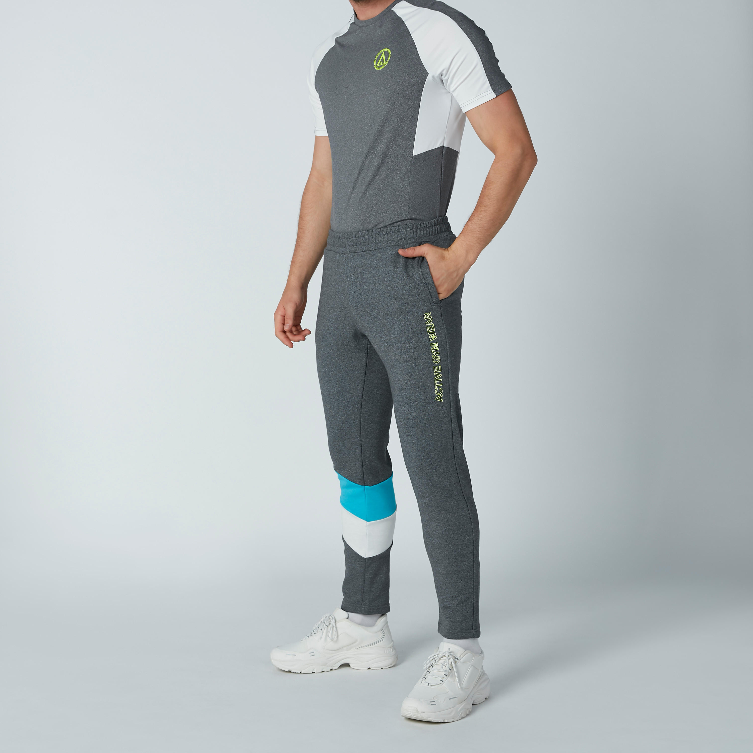 بنطال رياضي طويل بجيوب وطبعات-men-clothing-sportswearandactivewear-bottoms-image-1