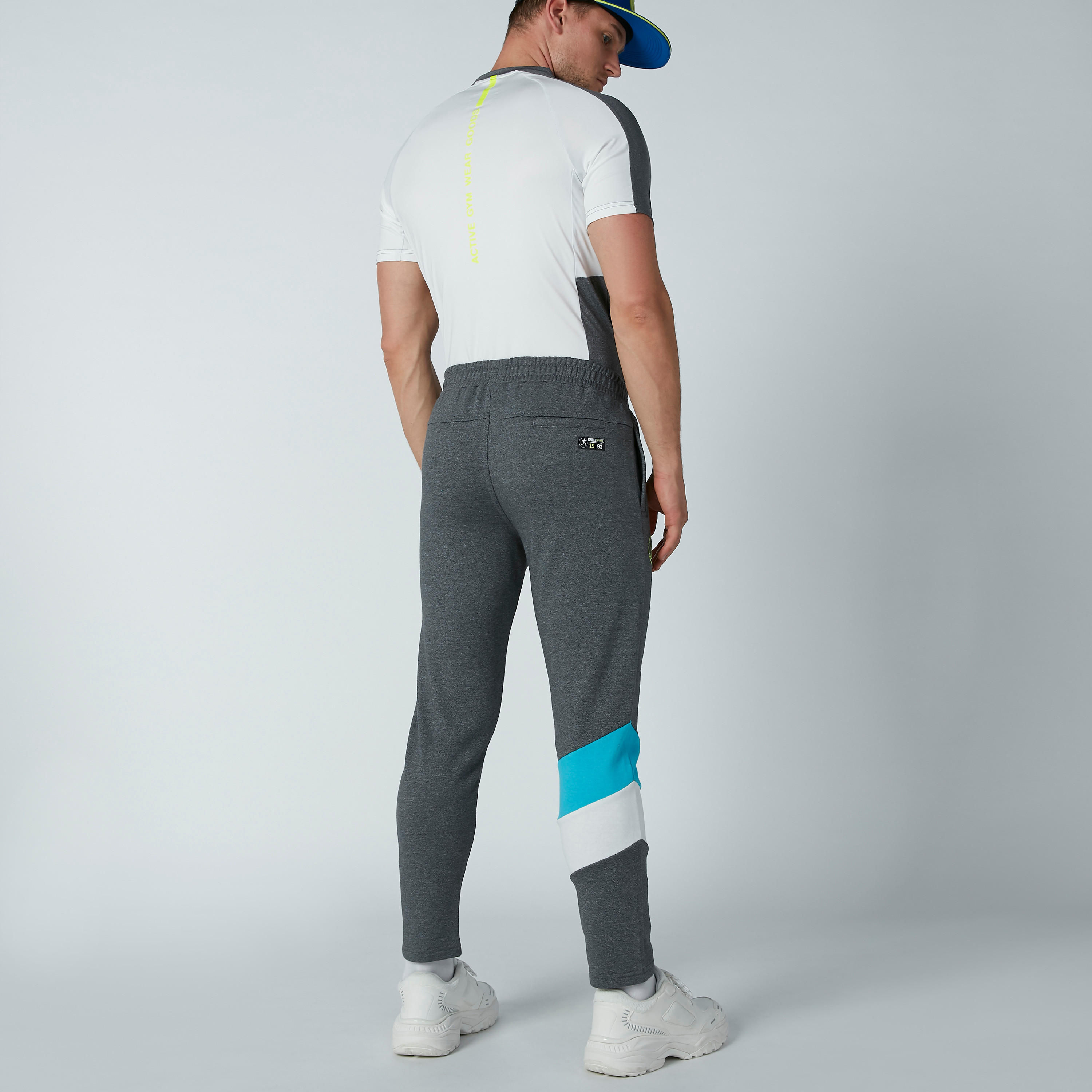 بنطال رياضي طويل بجيوب وطبعات-men-clothing-sportswearandactivewear-bottoms-image-3