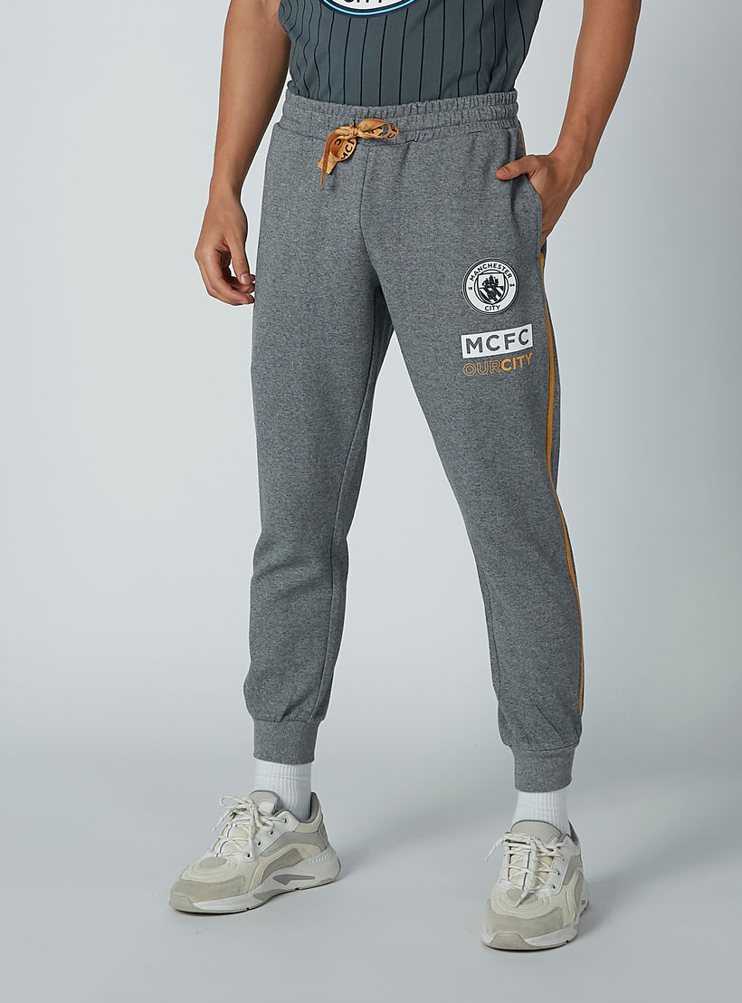 بنطال رياضي بجيوب وشريطة وطبعات-men-clothing-bottoms-joggers-image-1