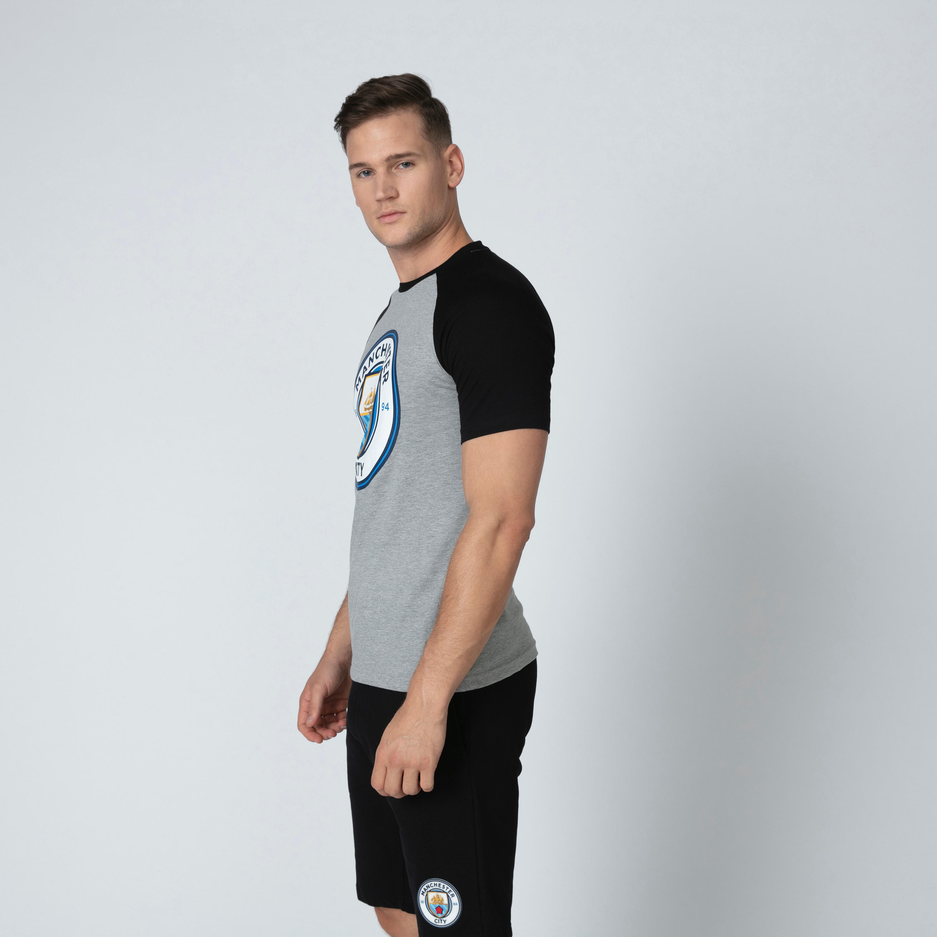 تيشيرت بياقة مستديرة وأكمام مغايرة وطبعات مانشستر سيتي-men-clothing-sportswearandactivewear-tshirtsandpolos-image-5