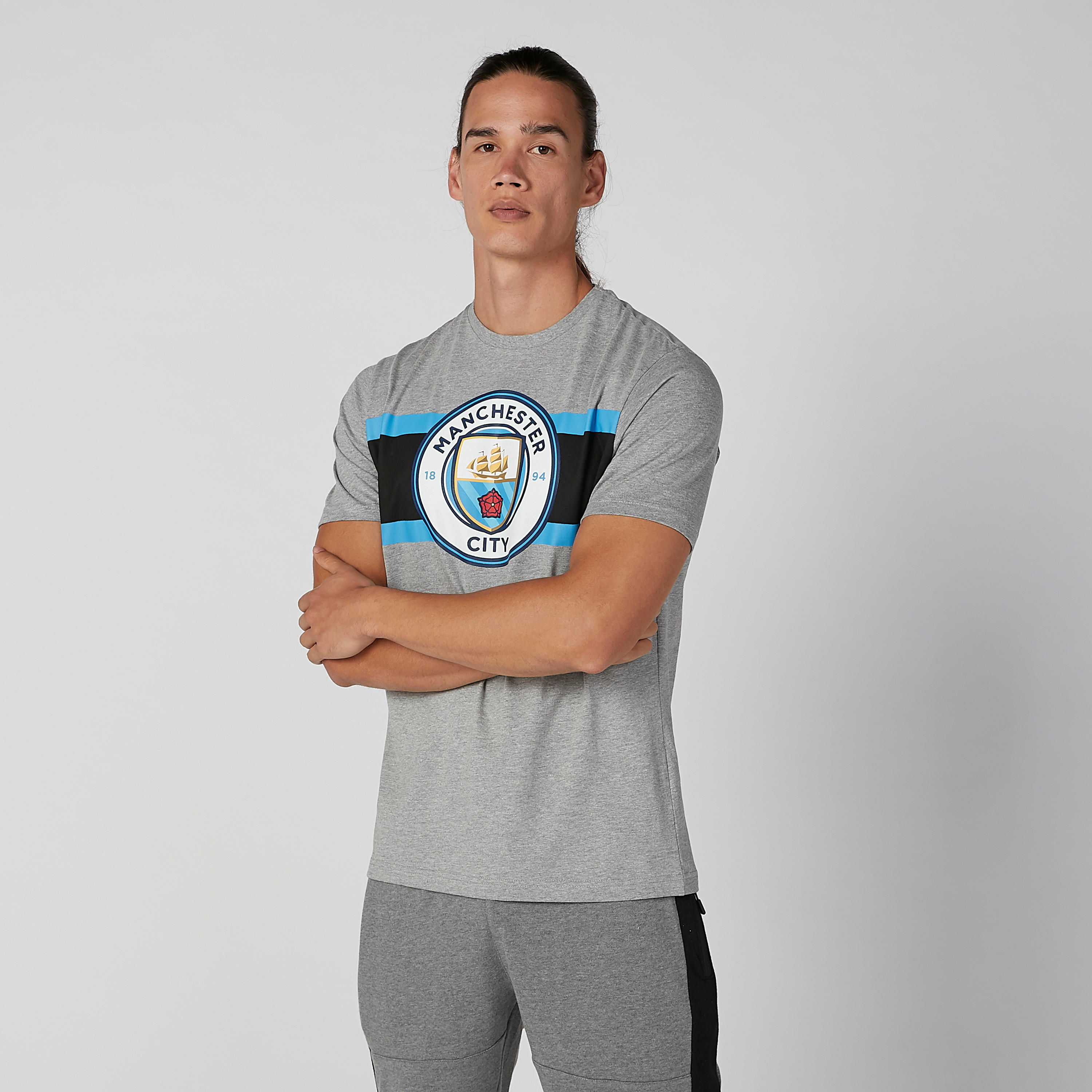 تيشيرت بياقة ضيّقة وأكمام قصيرة وطبعات مانشستر سيتي-men-clothing-sportswearandactivewear-tshirtsandpolos-image-2