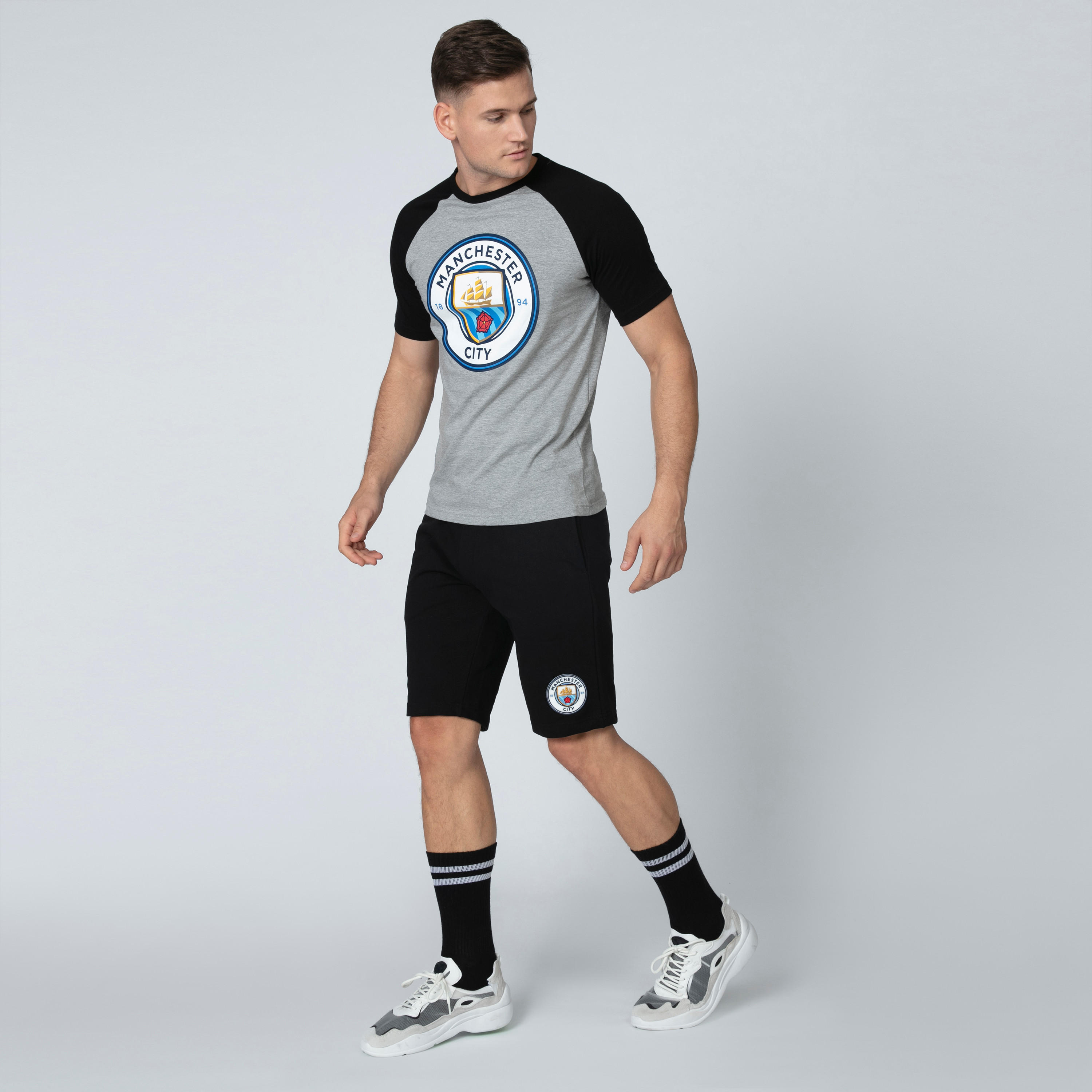 شورت برباط وجيوب وطبعات مانشستر سيتي-men-clothing-sportswearandactivewear-bottoms-image-1