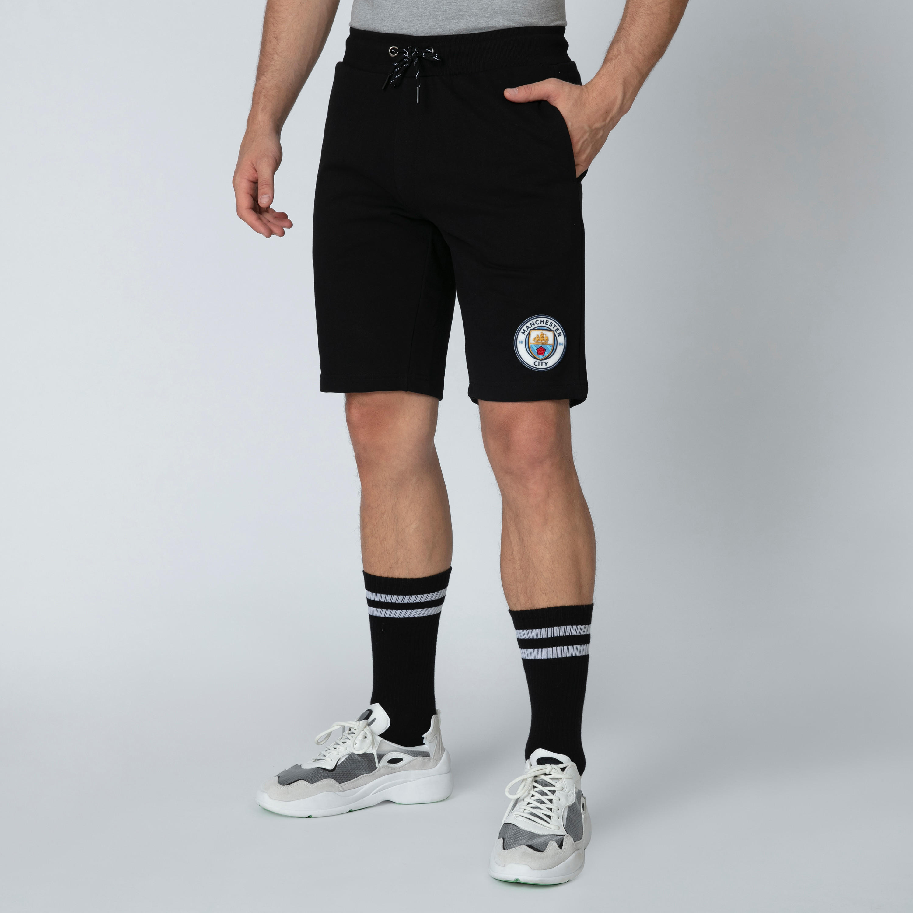 شورت برباط وجيوب وطبعات مانشستر سيتي-men-clothing-sportswearandactivewear-bottoms-image-3