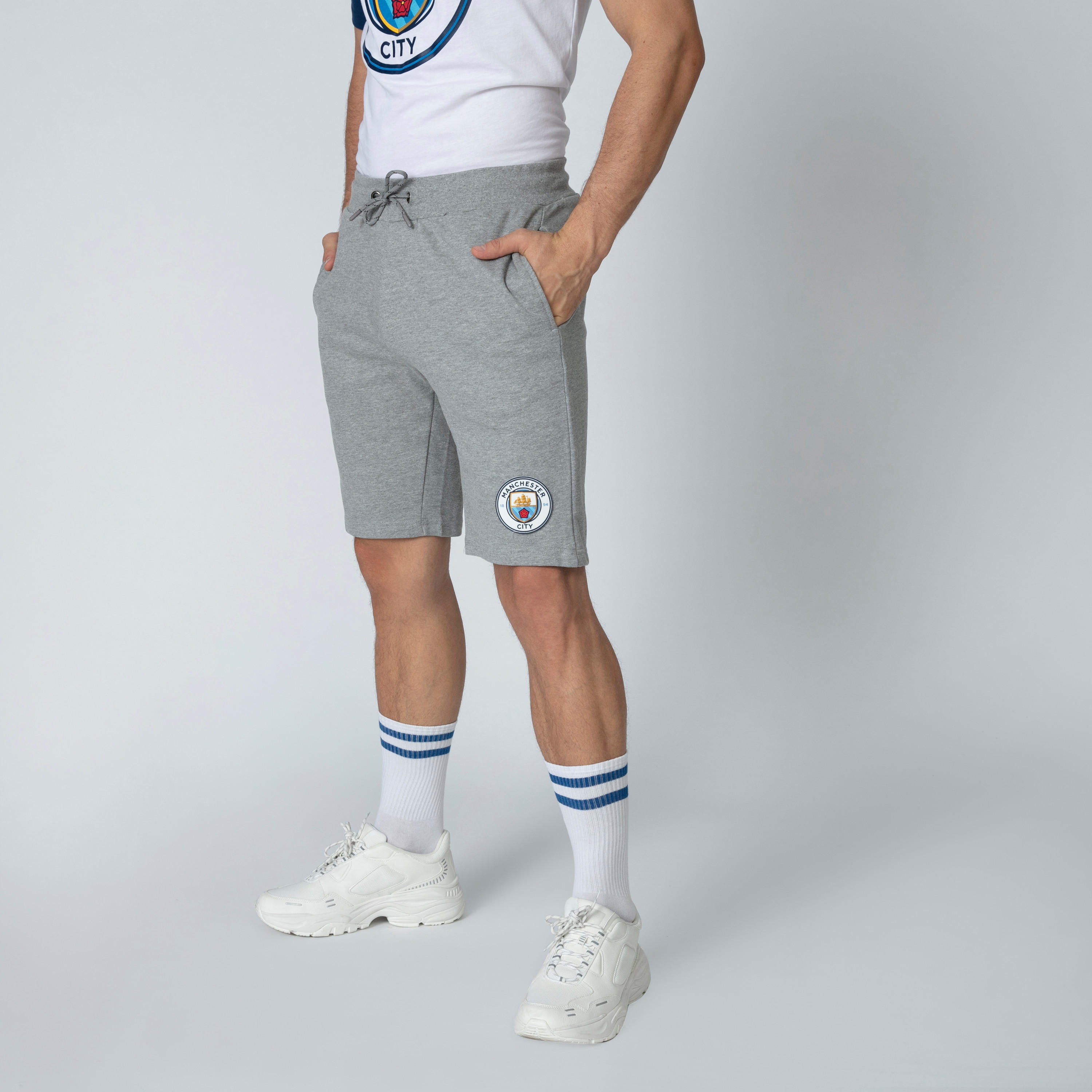 شورت برباط وجيوب وطبعات مانشستر سيتي-men-clothing-sportswearandactivewear-bottoms-image-1