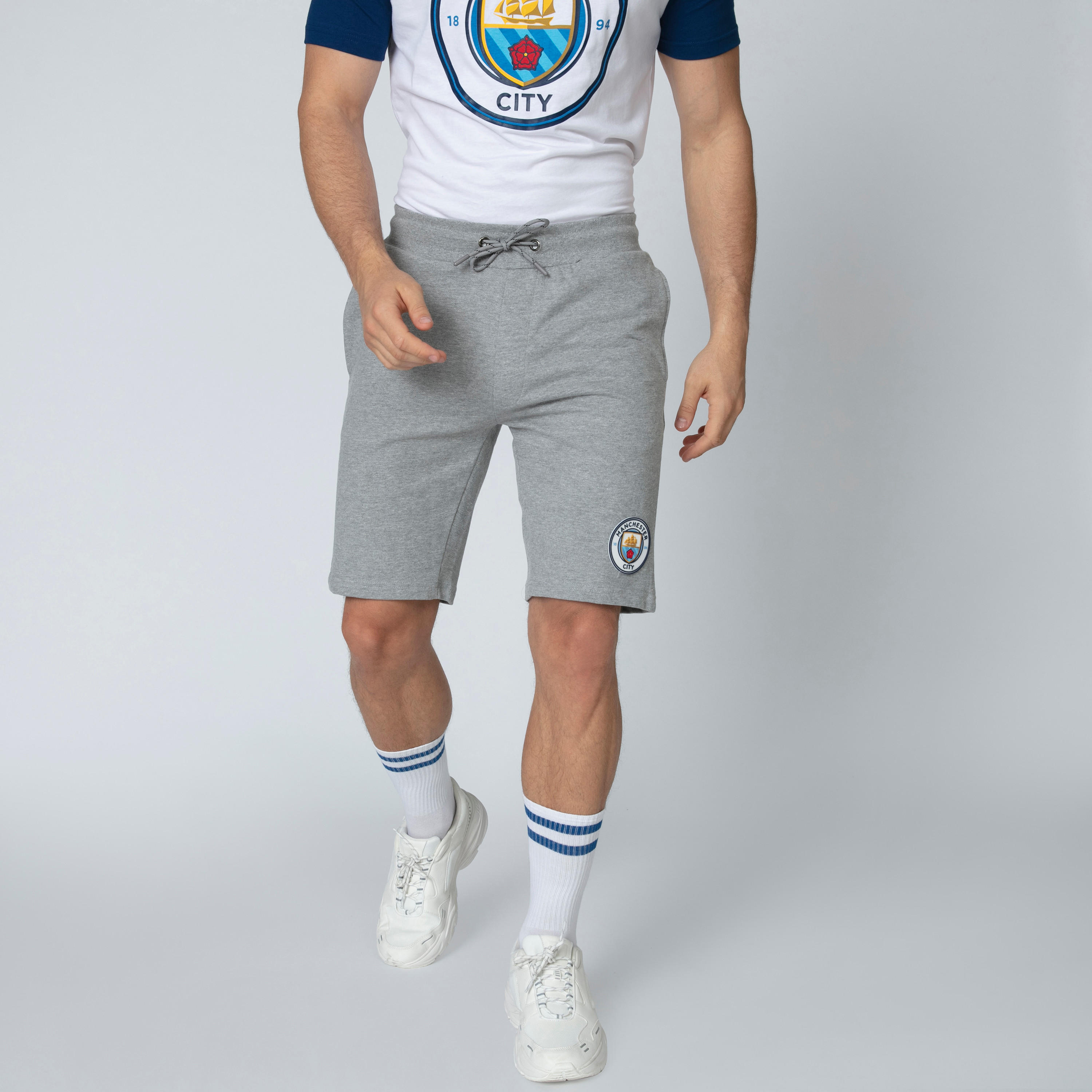 شورت برباط وجيوب وطبعات مانشستر سيتي-men-clothing-sportswearandactivewear-bottoms-image-3