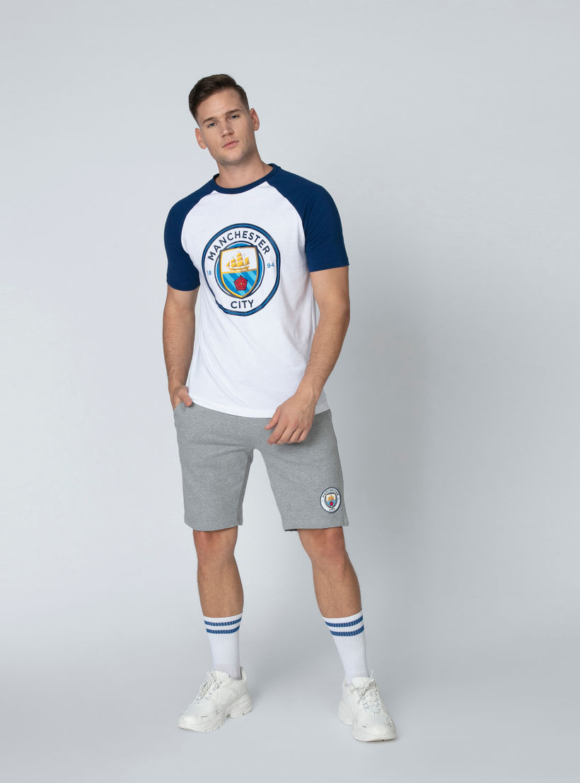 شورت برباط وجيوب وطبعات مانشستر سيتي-men-clothing-sportswearandactivewear-bottoms-image-4