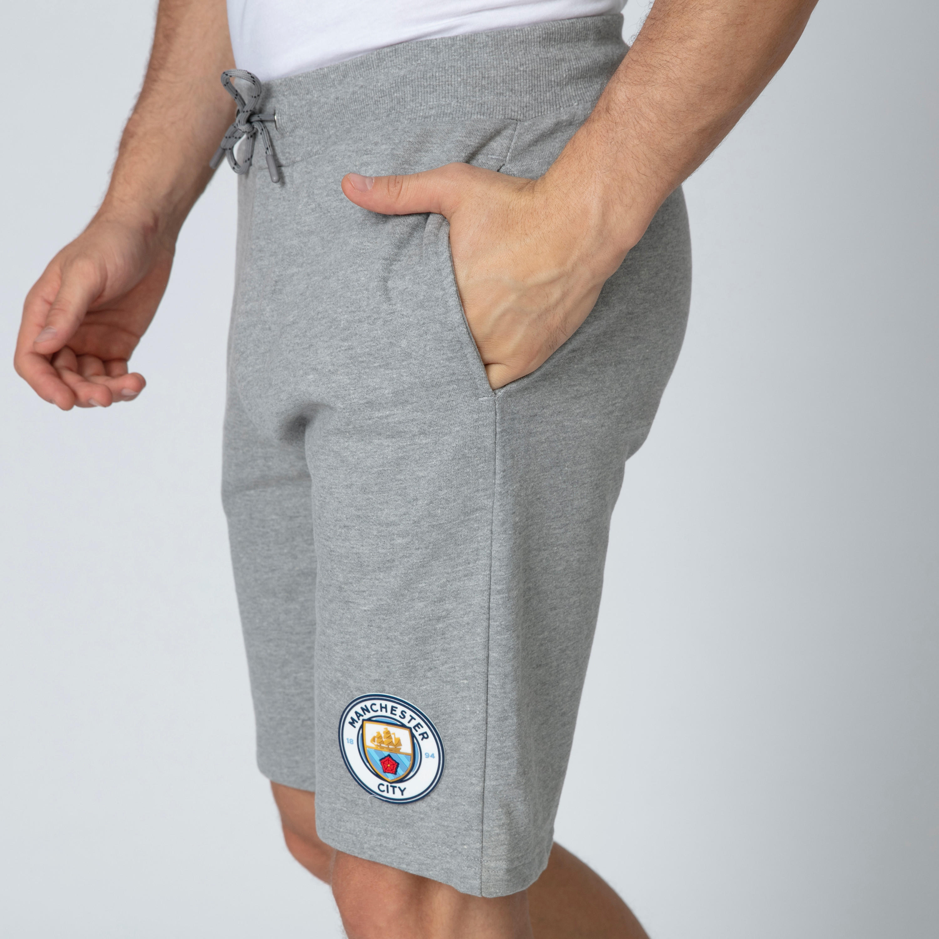 شورت برباط وجيوب وطبعات مانشستر سيتي-men-clothing-sportswearandactivewear-bottoms-image-5