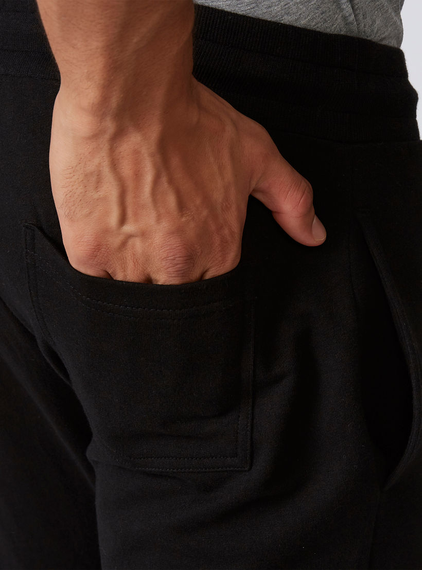بنطلون رياضي مستدام سادة طويل بجيوب -men-clothing-sportswearandactivewear-bottoms-image-1