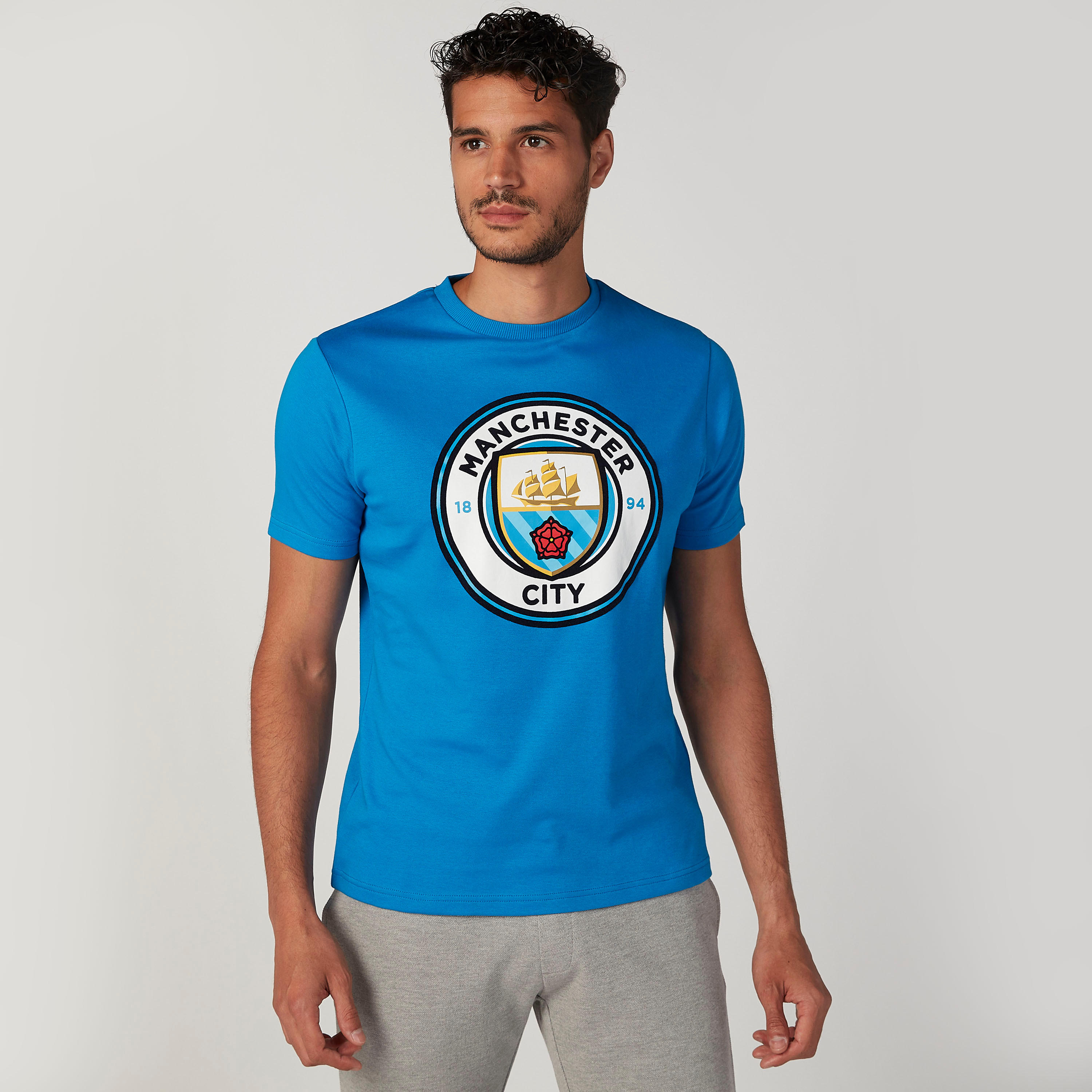 تيشيرت بياقة ضيّقة وأكمام قصيرة وطبعات-men-clothing-sportswearandactivewear-tshirtsandpolos-image-1