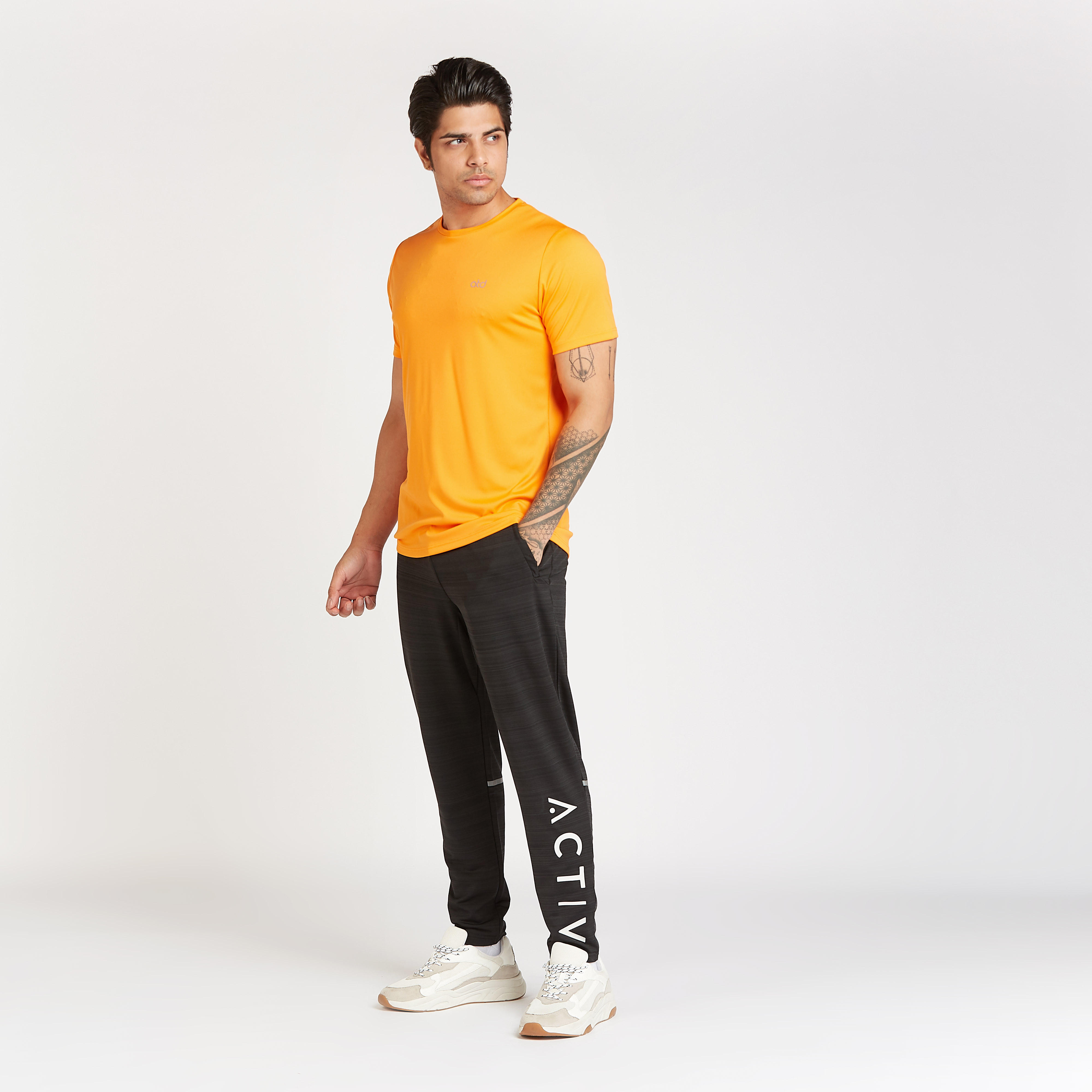 بنطلون رياضي طويل بطبعات وخصر مطّاطي وتفاصيل جيوب-men-clothing-sportswearandactivewear-bottoms-image-2