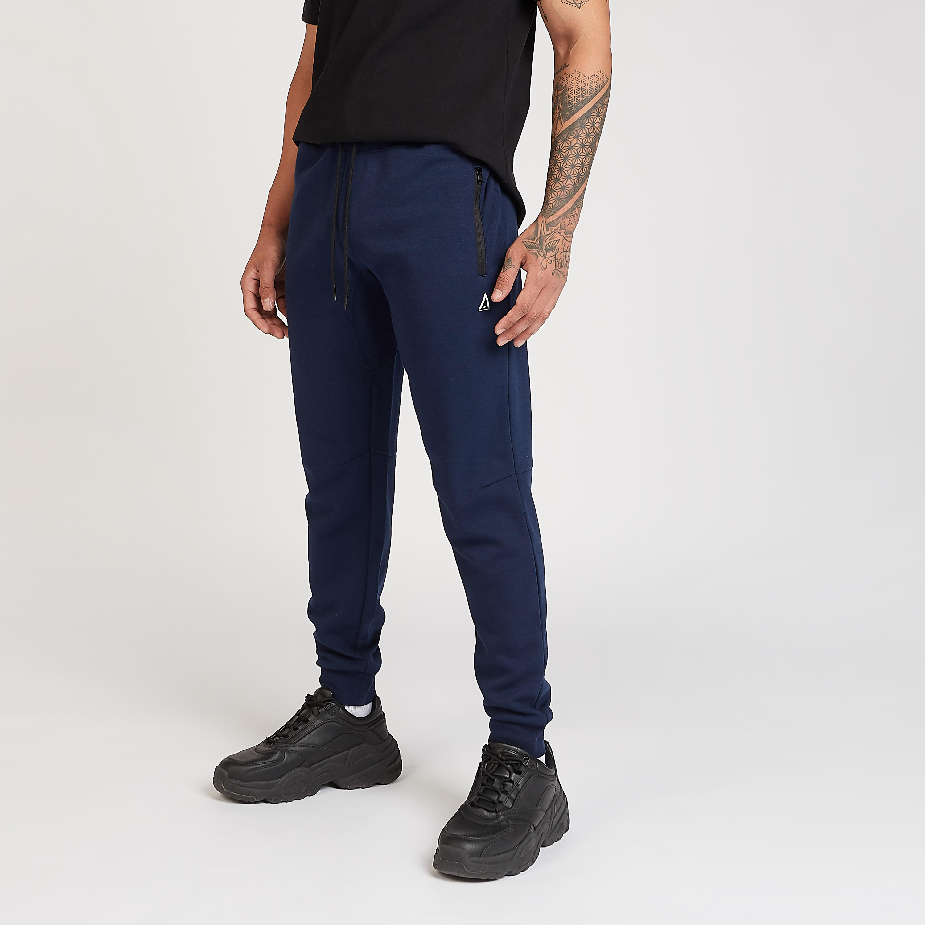 Sustainable Solid Jog Pants with Pocket Detail and Drawstring-men-clothing-sportswearandactivewear-bottoms-image-1