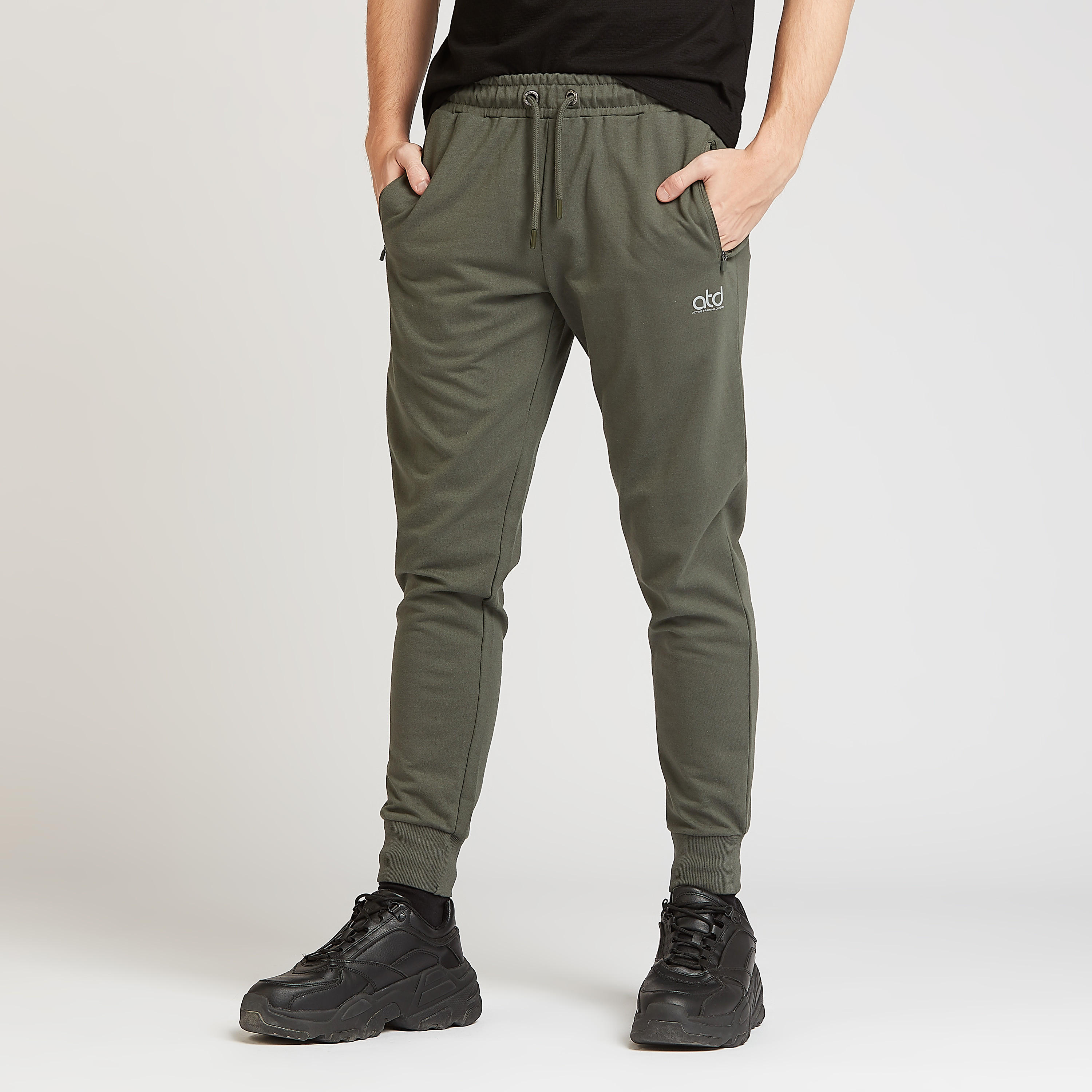 بنطلون رياضي مستدام سادة بتفاصيل جيوب و رباط-men-clothing-sportswearandactivewear-bottoms-image-5