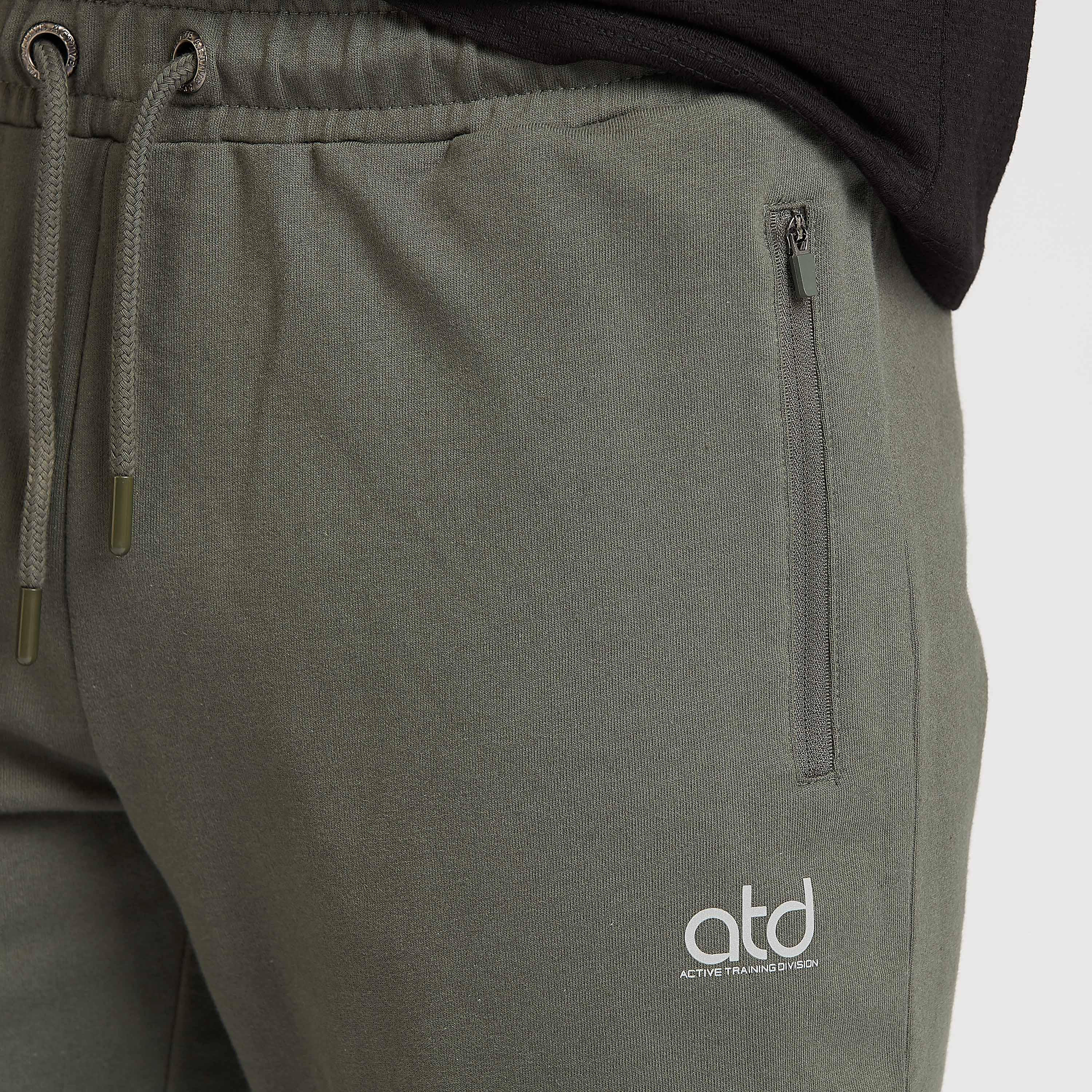 بنطلون رياضي مستدام سادة بتفاصيل جيوب و رباط-men-clothing-sportswearandactivewear-bottoms-image-1