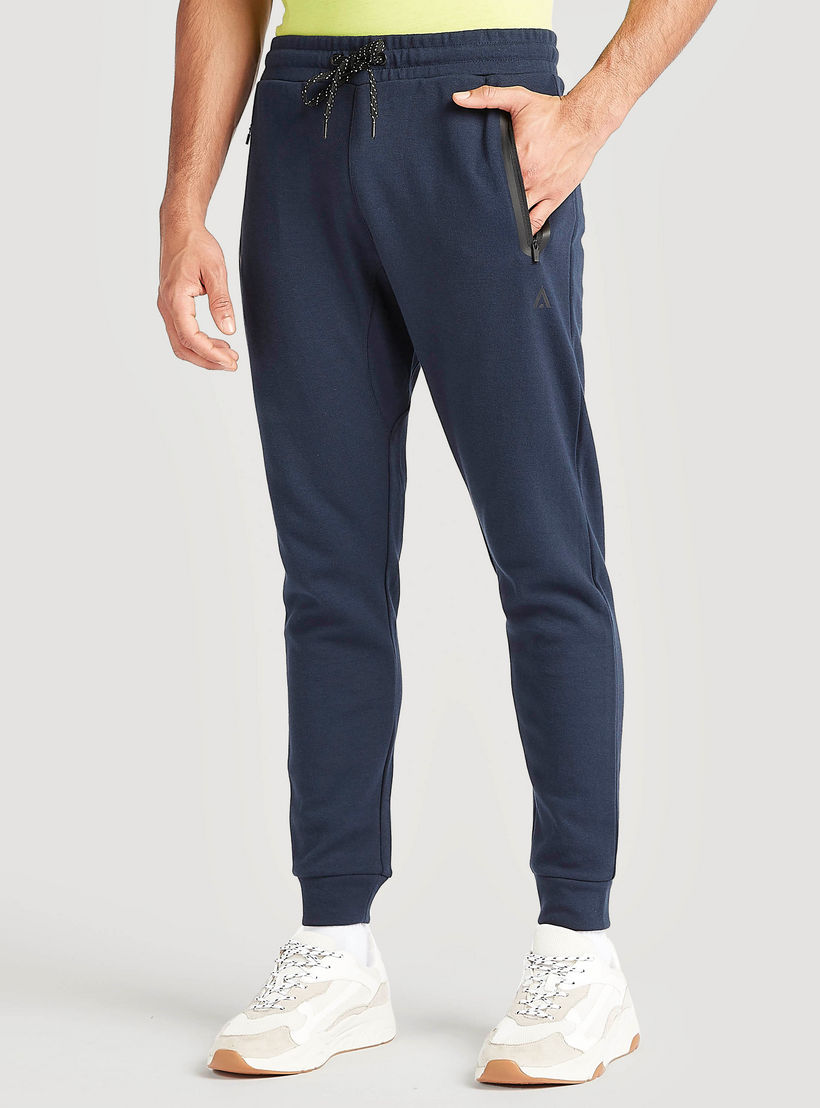Solid Track Pants with Drawstring Closure and Pockets-men-clothing-bottoms-joggers-image-1