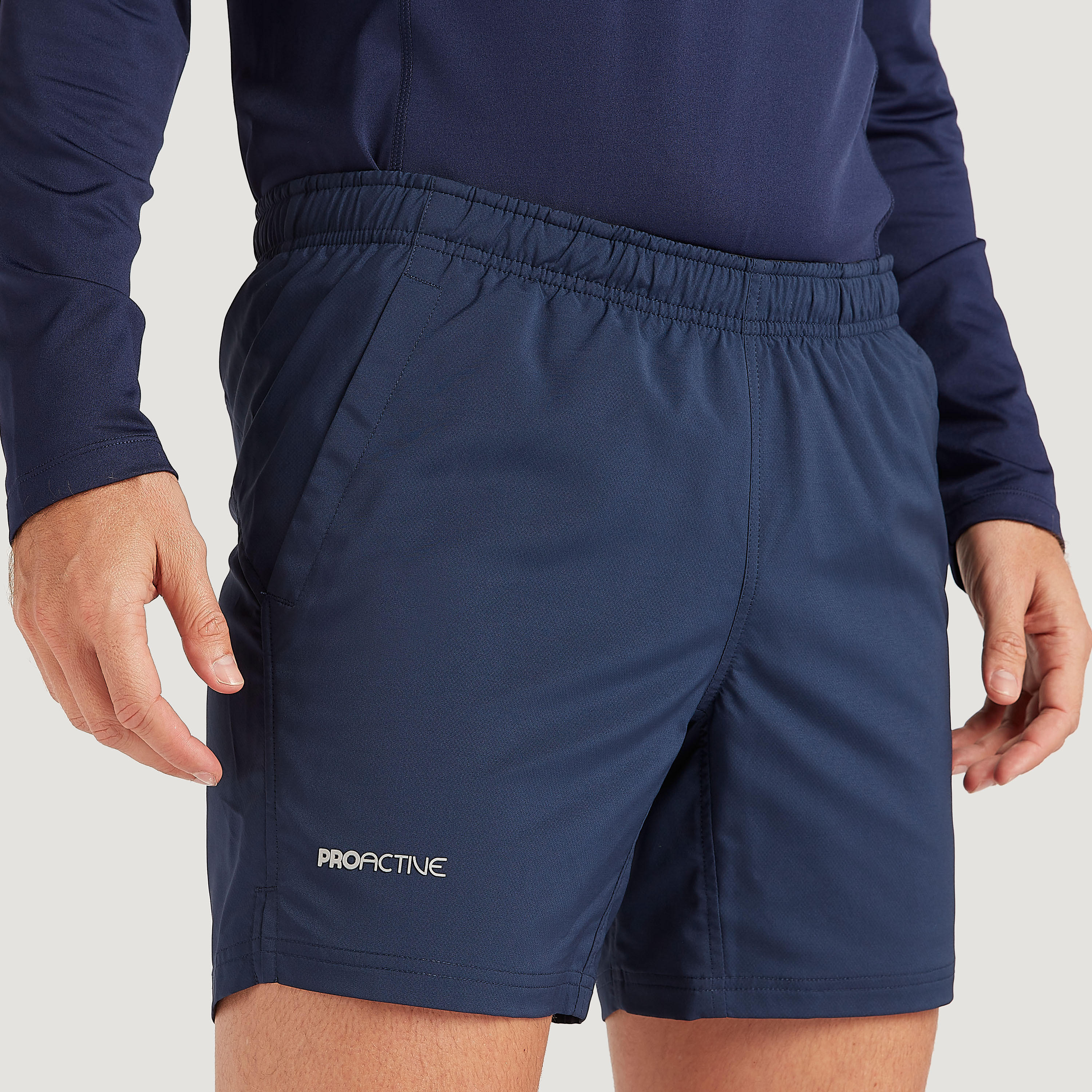شورت سادة بخصر مطاطي وجيوب-men-clothing-sportswearandactivewear-bottoms-image-7