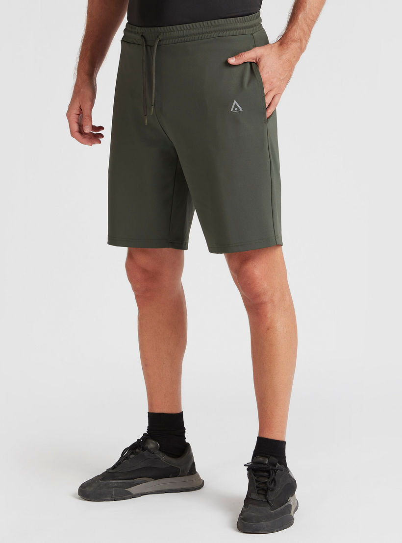 Solid Shorts with Elasticated Waistband and Pockets-men-clothing-sportswearandactivewear-bottoms-image-1
