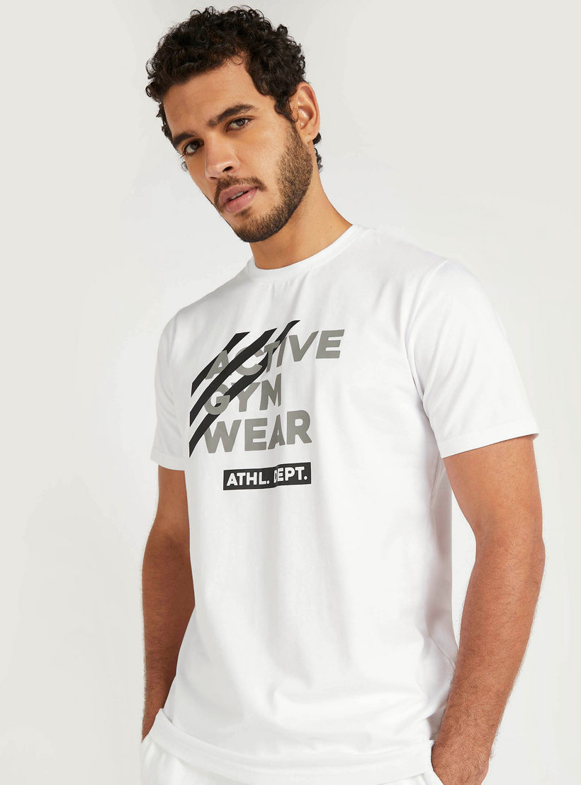 تيشيرت بياقة ضيّقة وأكمام قصيرة وطبعات-men-clothing-sportswearandactivewear-tshirtsandpolos-image-5