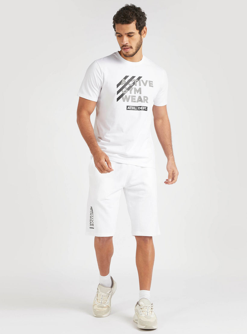 تيشيرت بياقة ضيّقة وأكمام قصيرة وطبعات-men-clothing-sportswearandactivewear-tshirtsandpolos-image-4