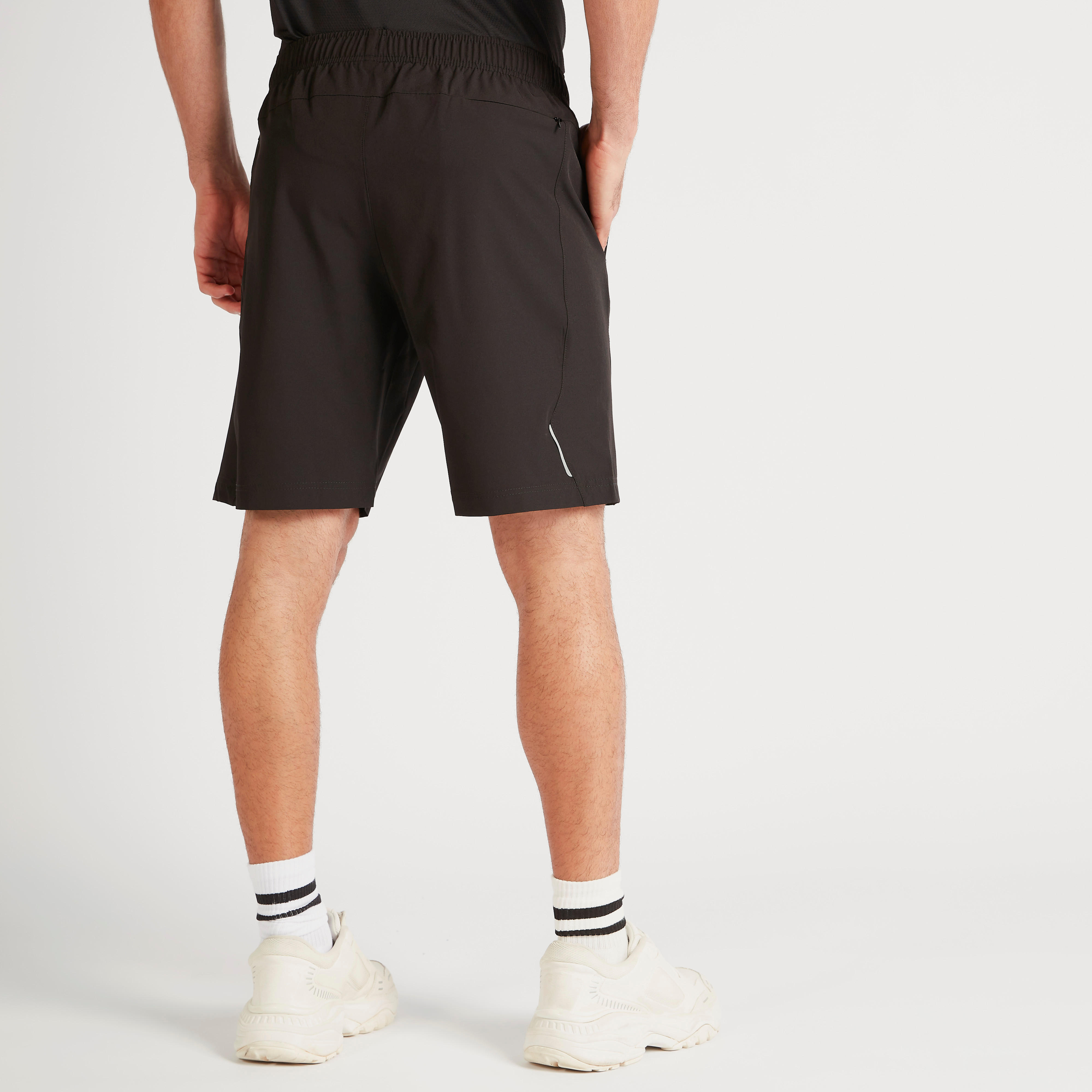 شورت سادة بخصر مطّاطي وجيوب-men-clothing-sportswearandactivewear-bottoms-image-1
