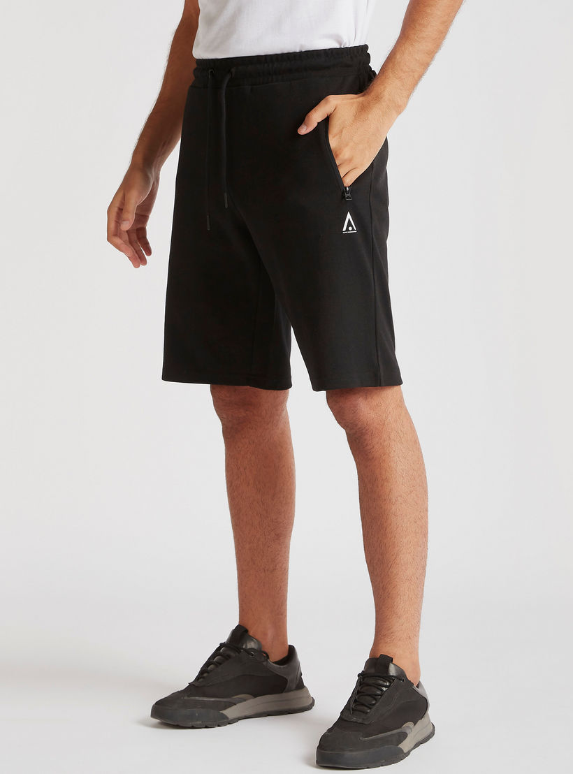 Solid Shorts with Zip Pockets and Drawstring Closure-men-clothing-sportswearandactivewear-bottoms-image-1