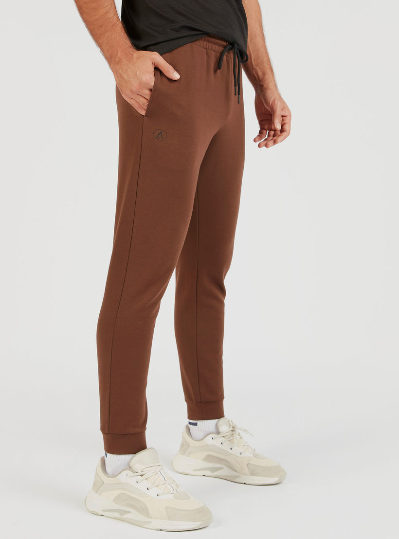 Solid Joggers with Drawstring Closure and Pockets-men-clothing-sportswearandactivewear-bottoms-image-1