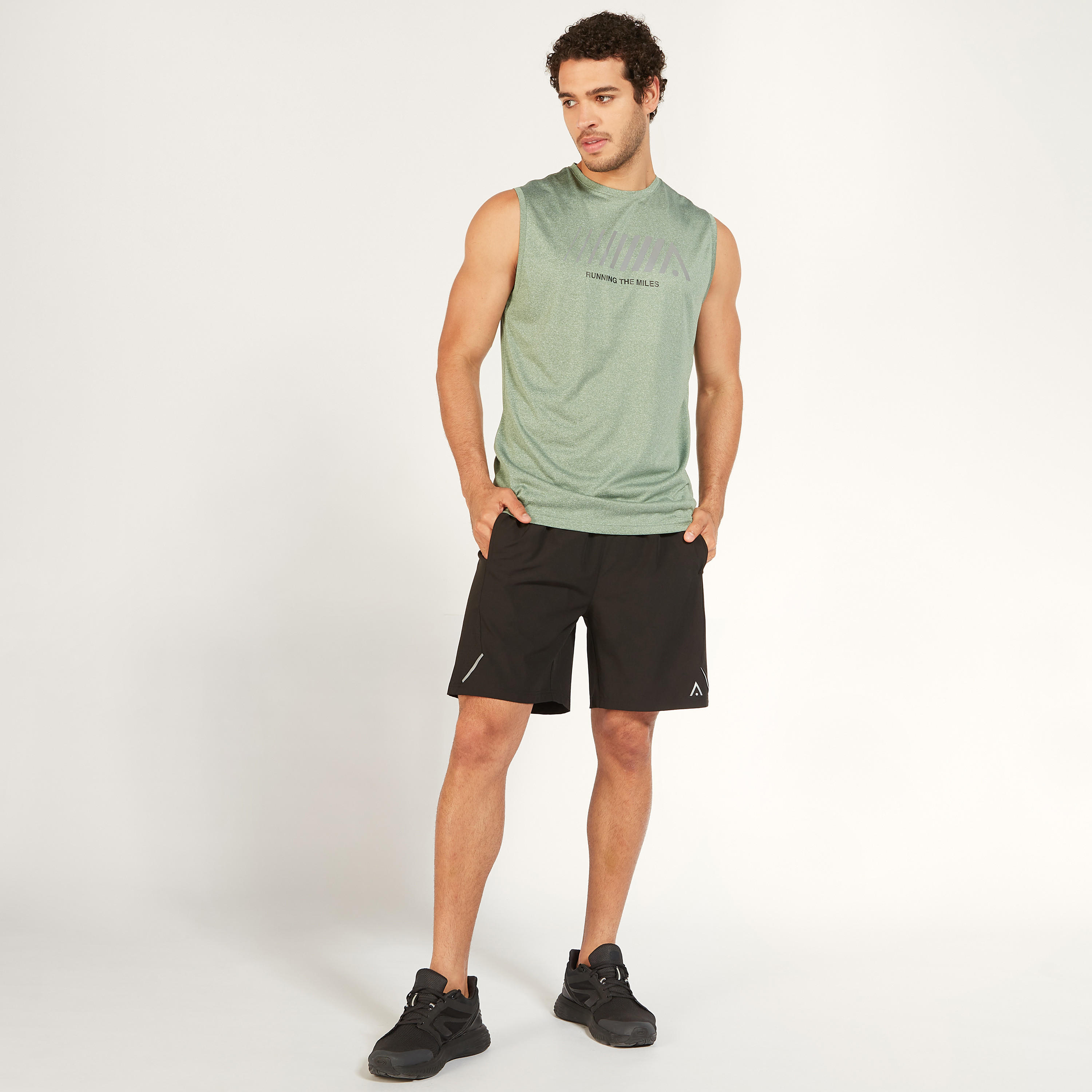 شورت سادة بخصر مطاطي وجيوب-men-clothing-sportswearandactivewear-bottoms-image-3