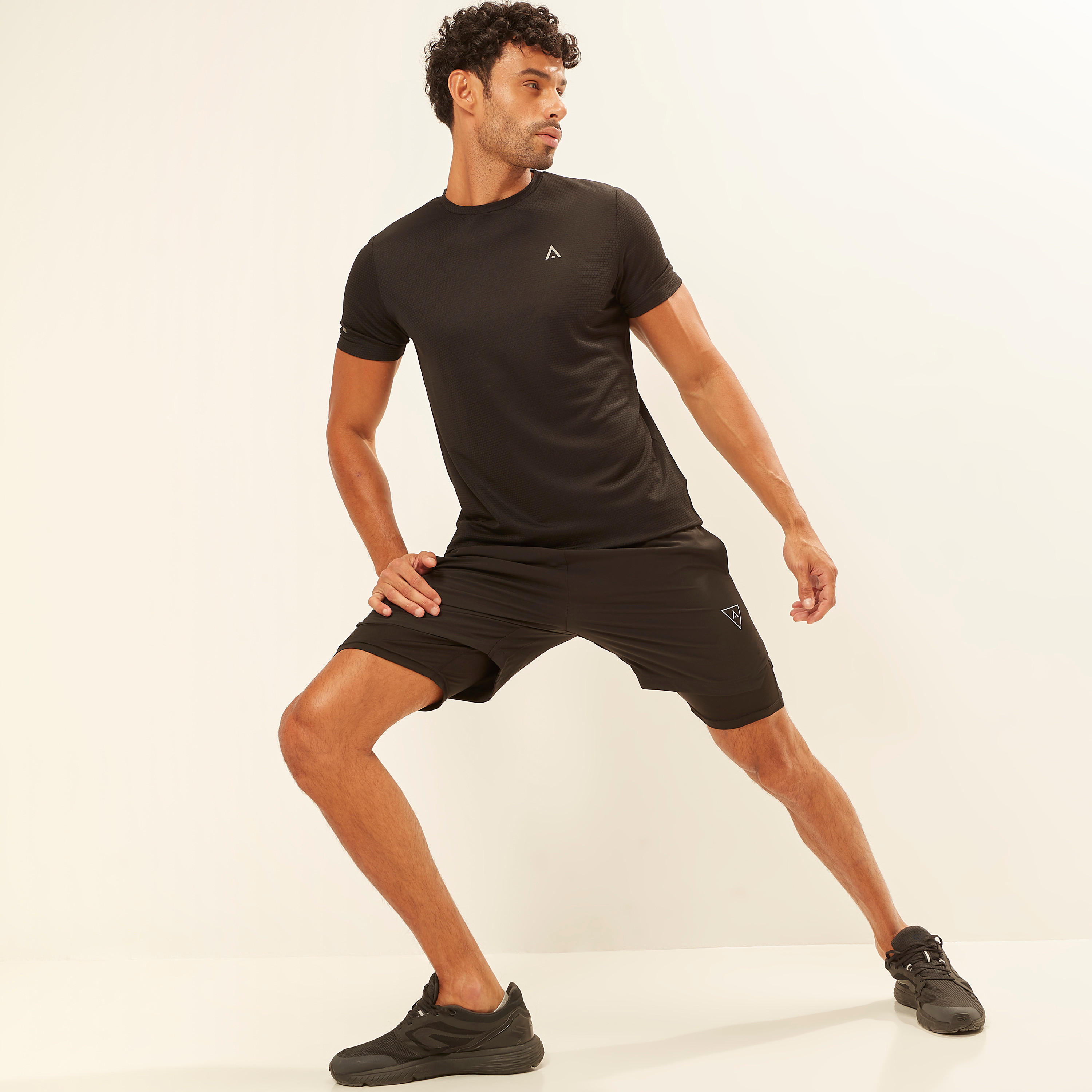 شورت هايبرد سادة برباط إغلاق وجيوب-men-clothing-sportswearandactivewear-bottoms-image-5