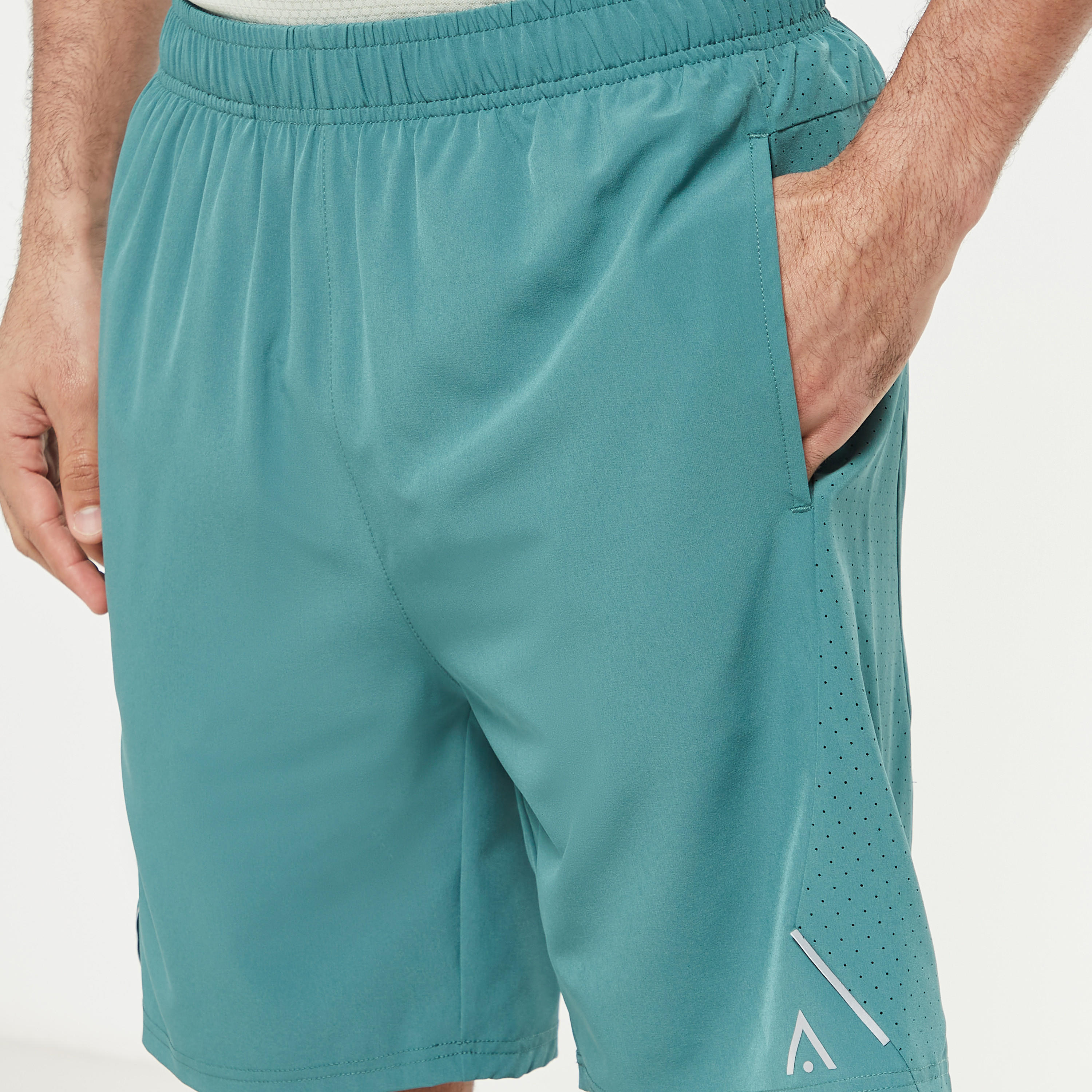 شورت بشريطة شبكية وخصر مطّاطي وجيوب-men-clothing-bottoms-shorts-image-4