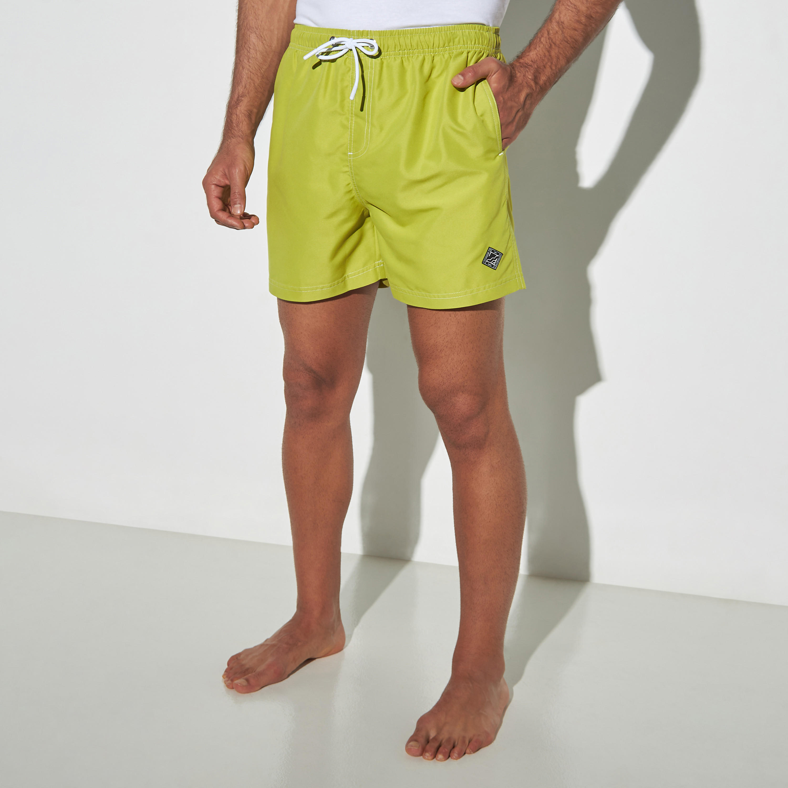 Solid Beach Shorts with Drawstring Closure and Pockets-men-clothing-sportswearandactivewear-bottoms-image-1