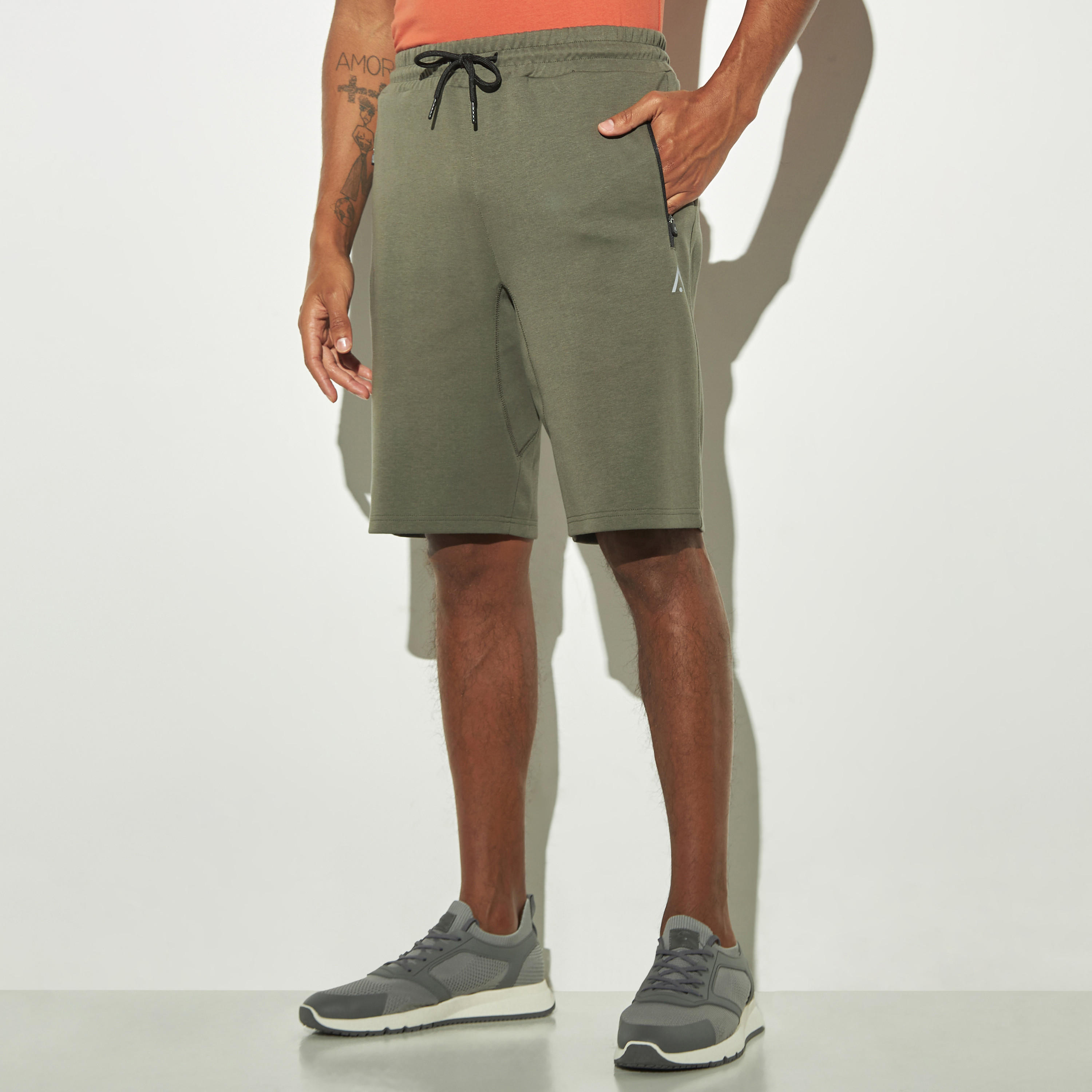 Solid Shorts with Drawstring Closure and Zipper Pockets-men-clothing-sportswearandactivewear-bottoms-image-1
