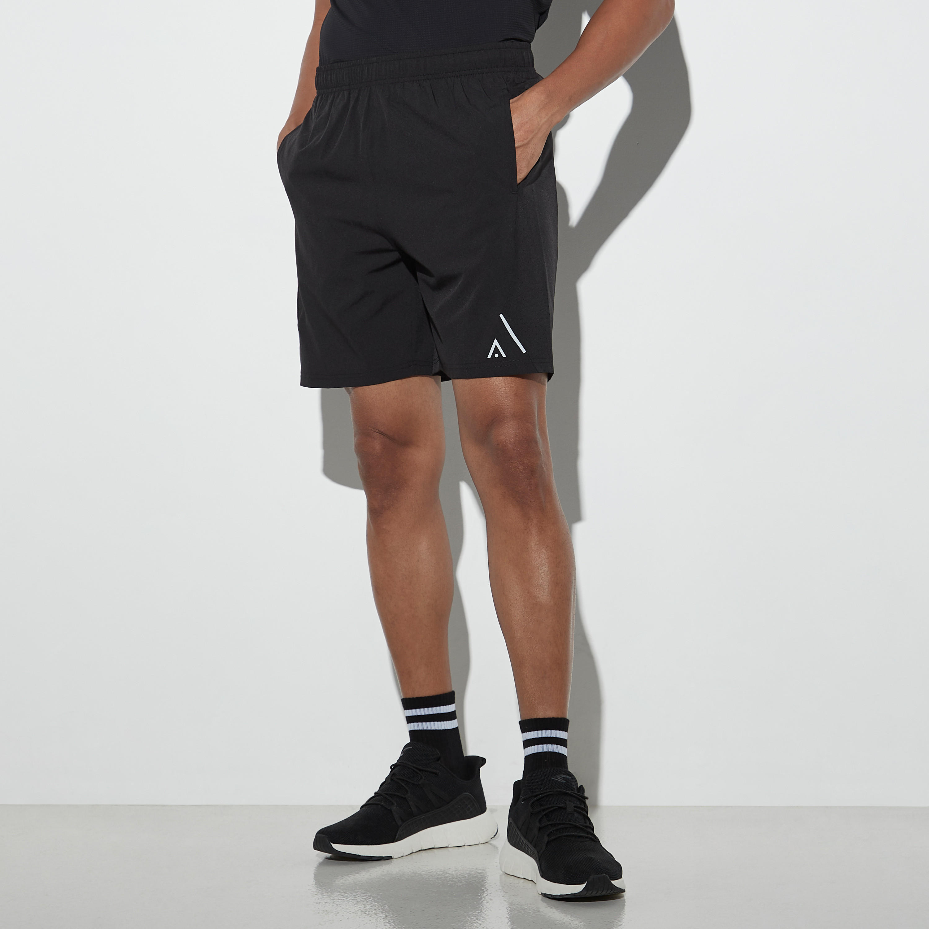 Solid Performance Shorts with Perforation Panel and Pockets-men-clothing-sportswearandactivewear-bottoms-image-1