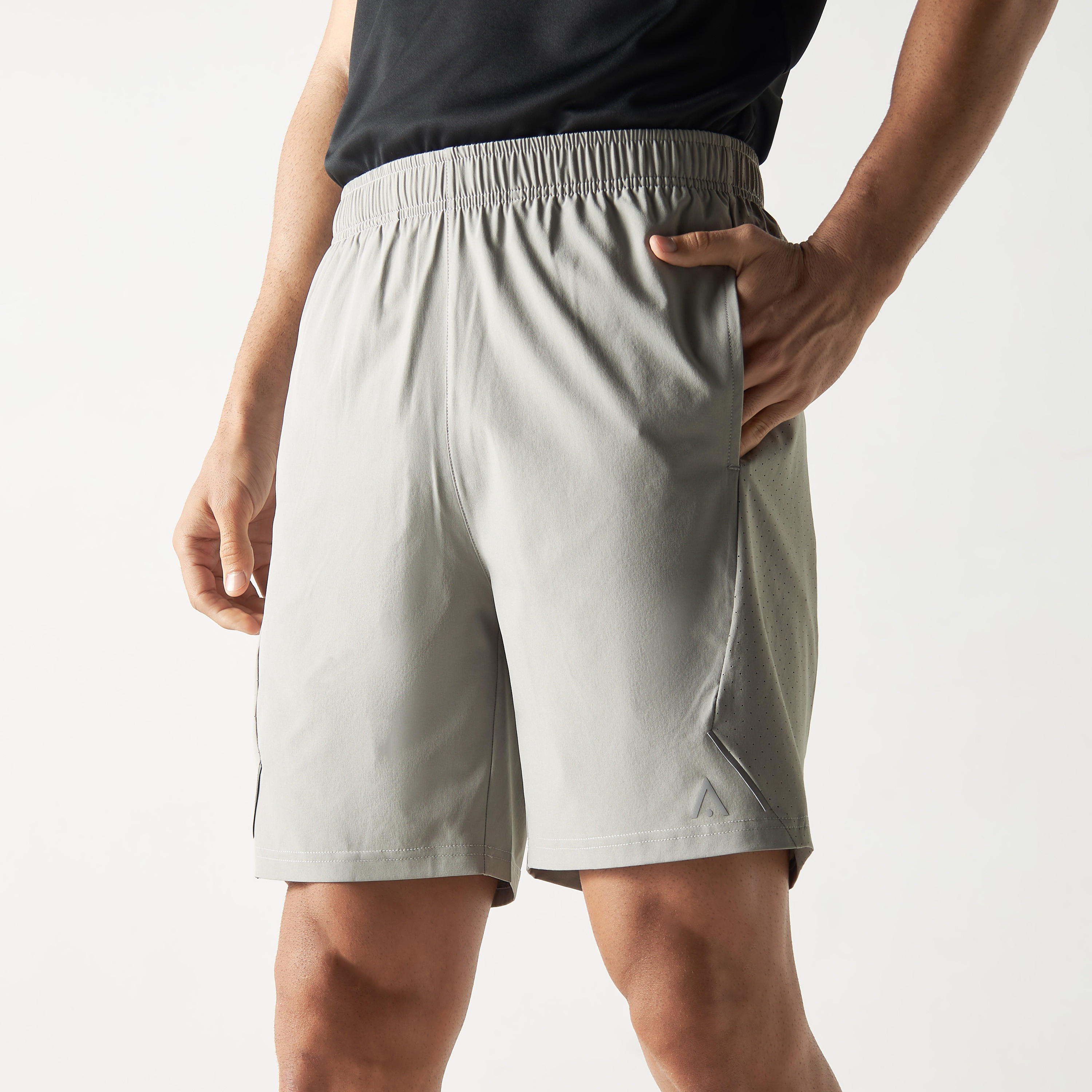Solid Performance Shorts with Perforated Panel and Elasticated Waistband-men-clothing-sportswearandactivewear-bottoms-image-1
