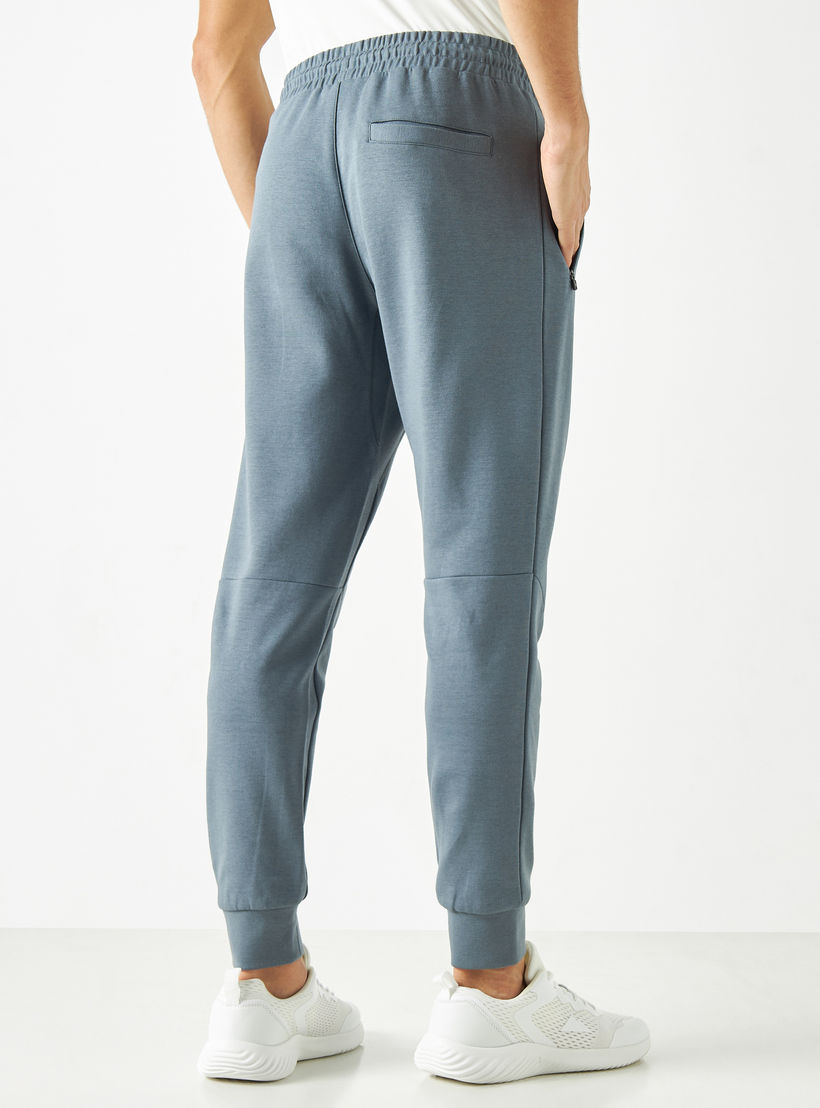 بنطلون رياضي سادة برباط إغلاق وجيوب-men-clothing-sportswearandactivewear-bottoms-image-2